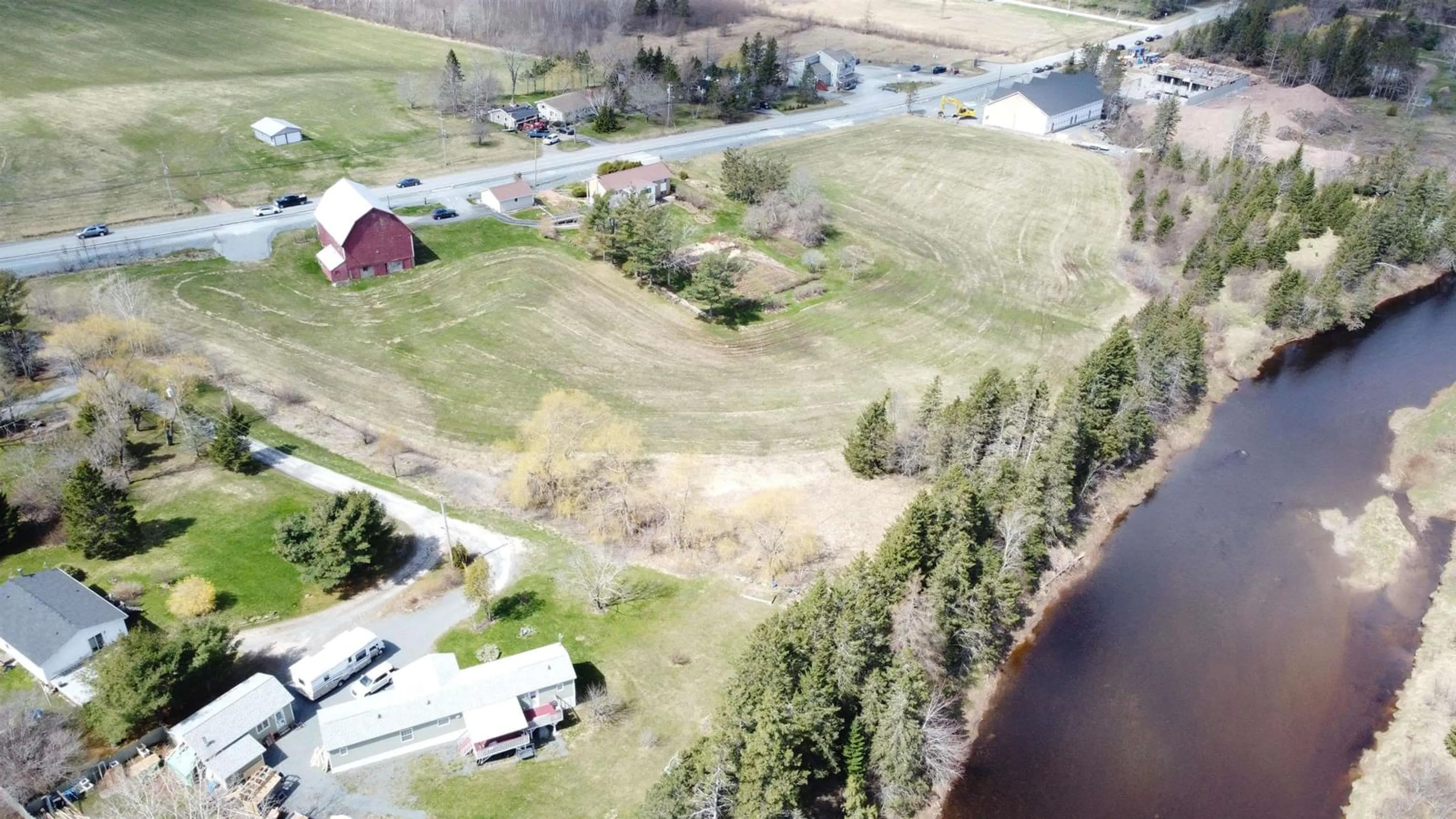 A pic from outside/outdoor area/front of a property/back of a property/a pic from drone, water/lake/river/ocean view for 373 214 Hwy, Elmsdale Nova Scotia B2S 2L8