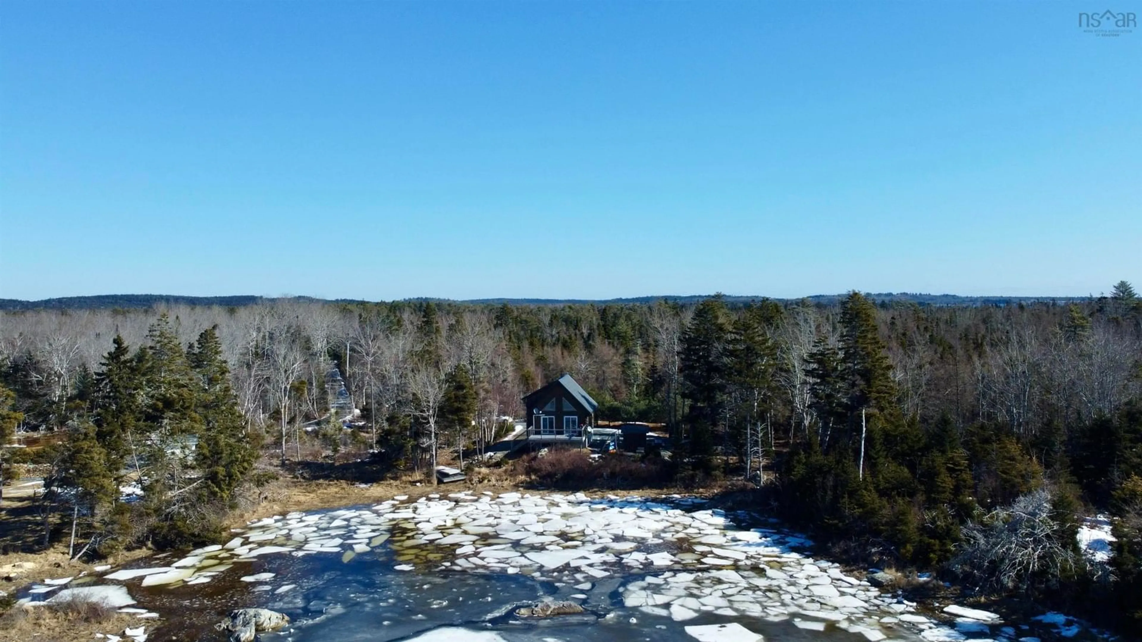 A pic from outside/outdoor area/front of a property/back of a property/a pic from drone, water/lake/river/ocean view for 164 Indian Point Rd, East Port Medway Nova Scotia B0J 2H0