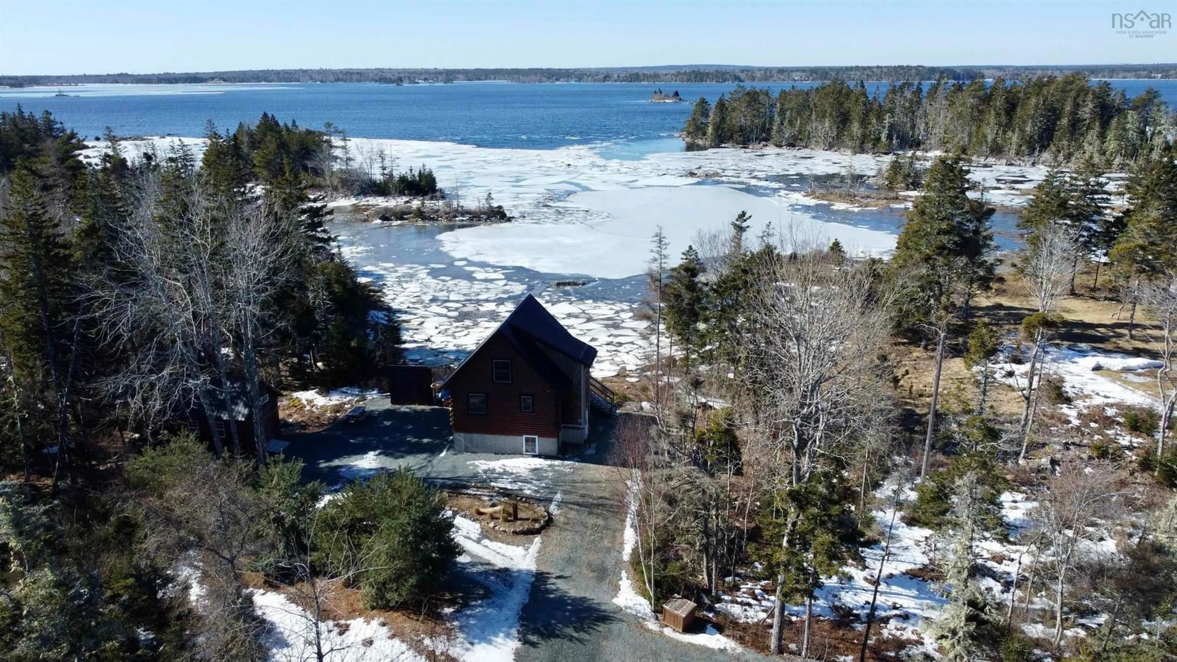 A pic from outside/outdoor area/front of a property/back of a property/a pic from drone, water/lake/river/ocean view for 164 Indian Point Rd, East Port Medway Nova Scotia B0J 2H0