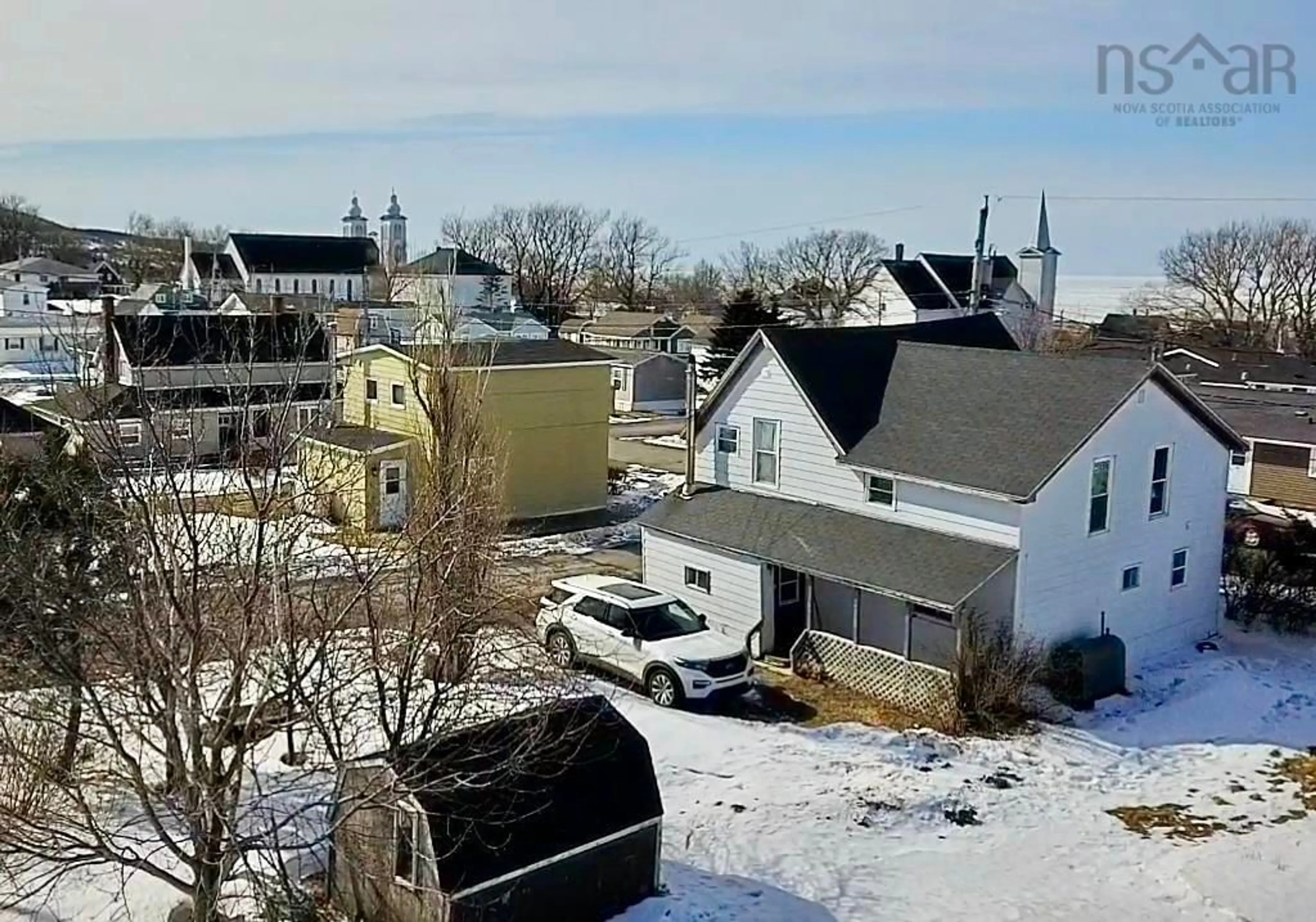 A pic from outside/outdoor area/front of a property/back of a property/a pic from drone, city buildings view from balcony for 16 Forest St, Inverness Nova Scotia B0E 1N0