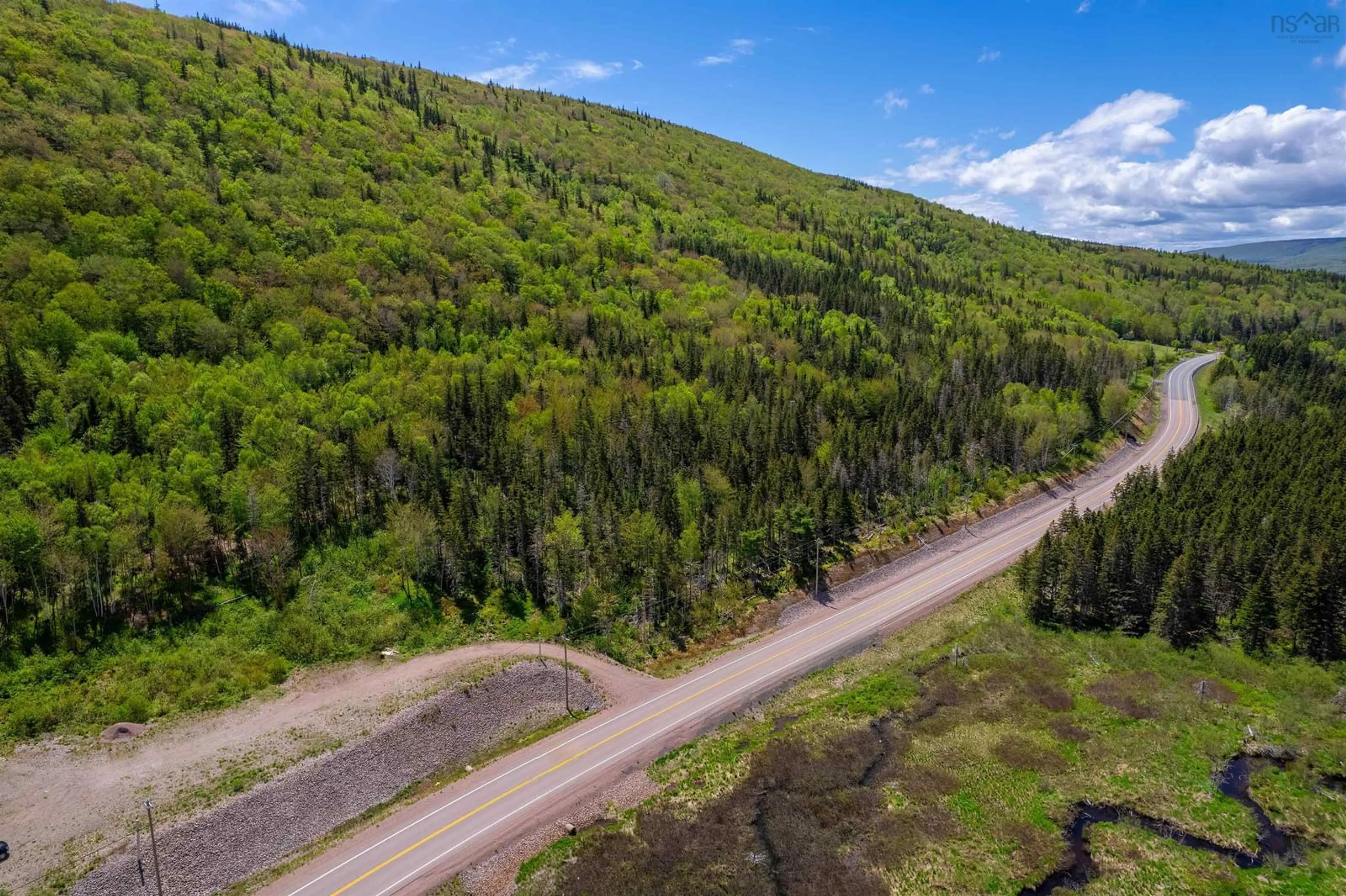 A pic from outside/outdoor area/front of a property/back of a property/a pic from drone, forest/trees view for 47403 Cabot Trail, Goose Cove Nova Scotia B0E 1B0