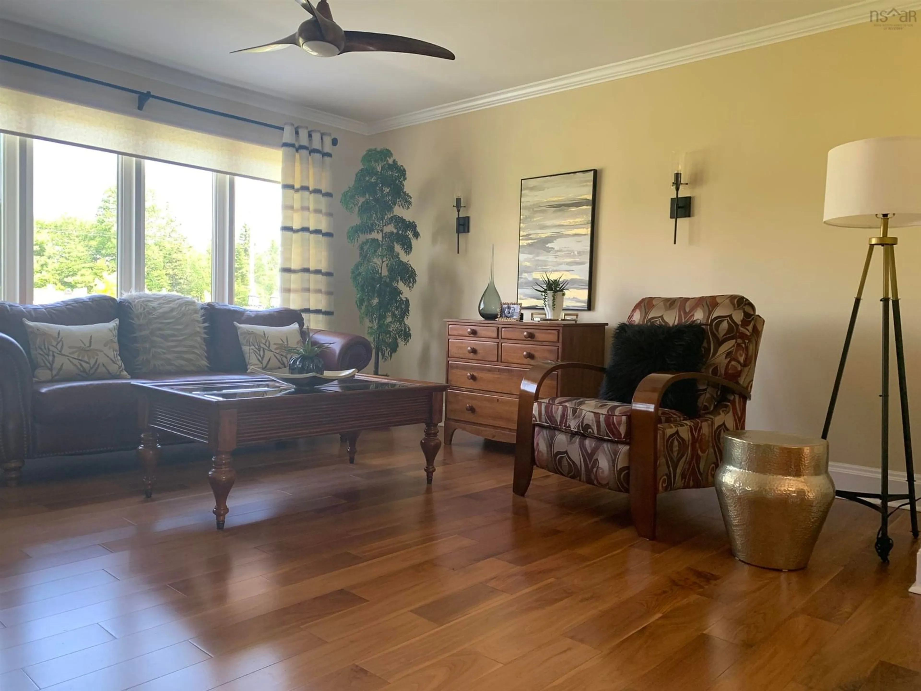 Living room with furniture, wood/laminate floor for 17873 Ns-316, Country Harbour Nova Scotia B0H 1J0