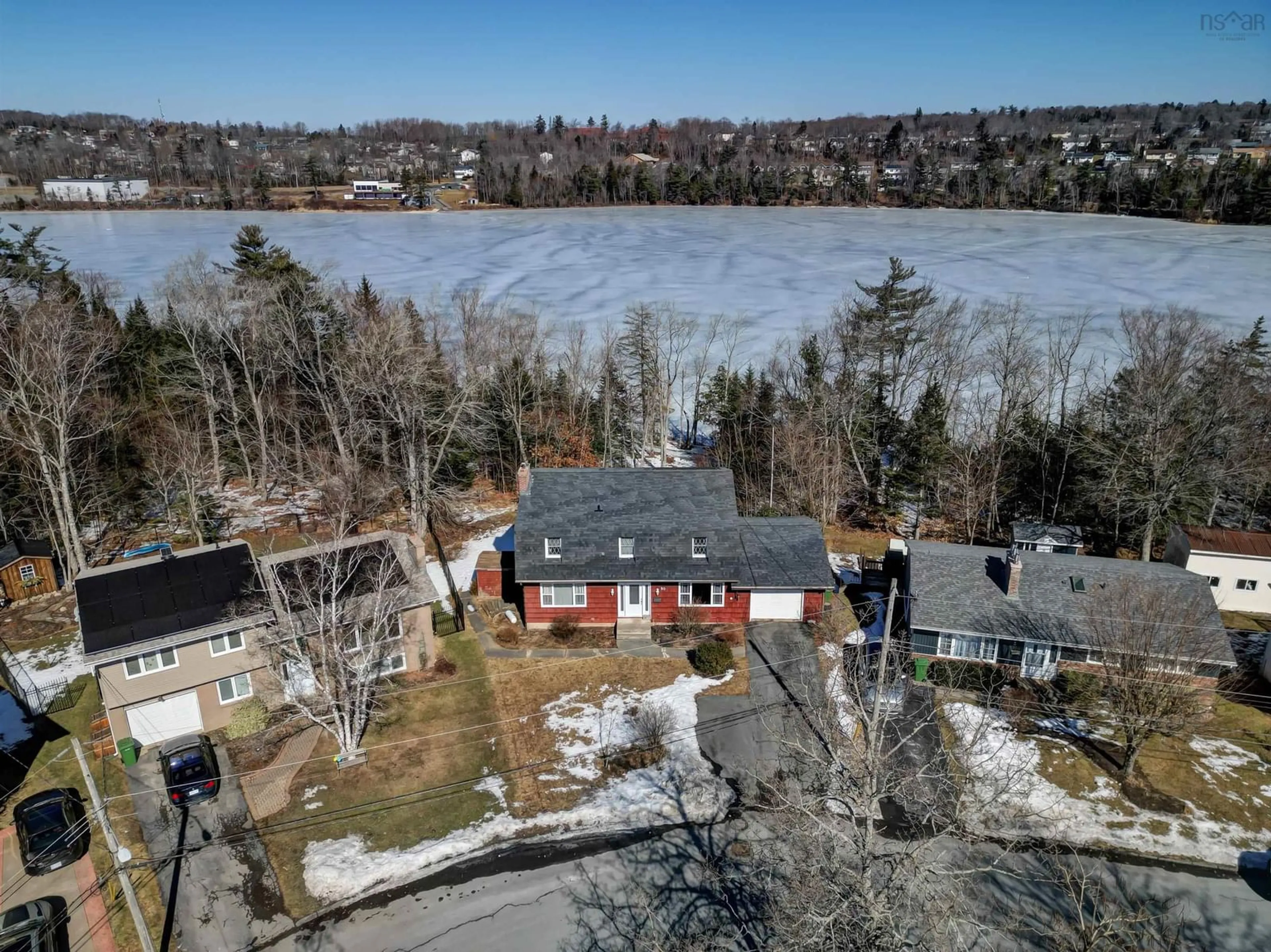 A pic from outside/outdoor area/front of a property/back of a property/a pic from drone, water/lake/river/ocean view for 90 Johnson Cres, Lower Sackville Nova Scotia B4C 3A4