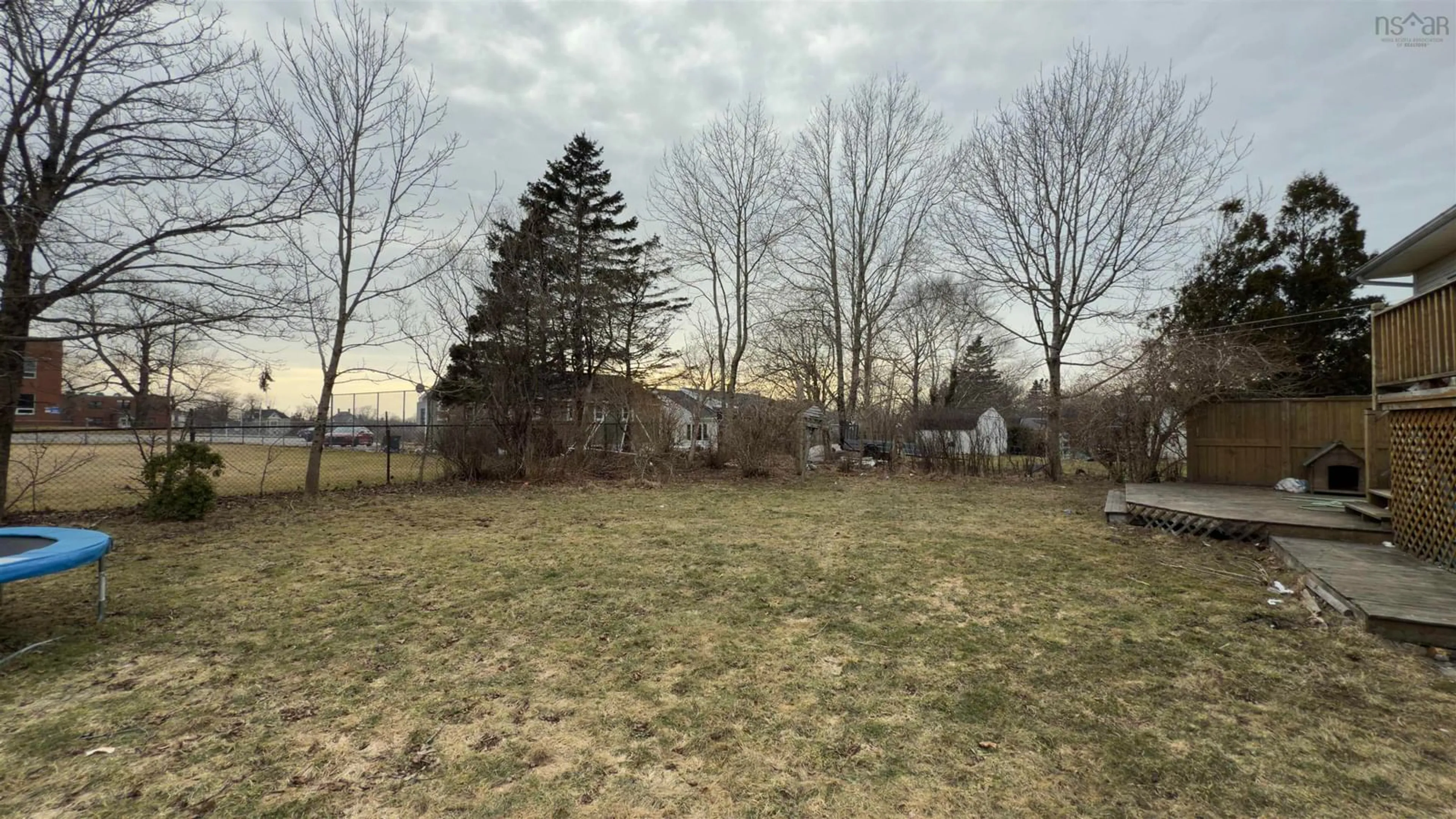 A pic from outside/outdoor area/front of a property/back of a property/a pic from drone, forest/trees view for 59 Porter St, Yarmouth Nova Scotia B5A 2Y8