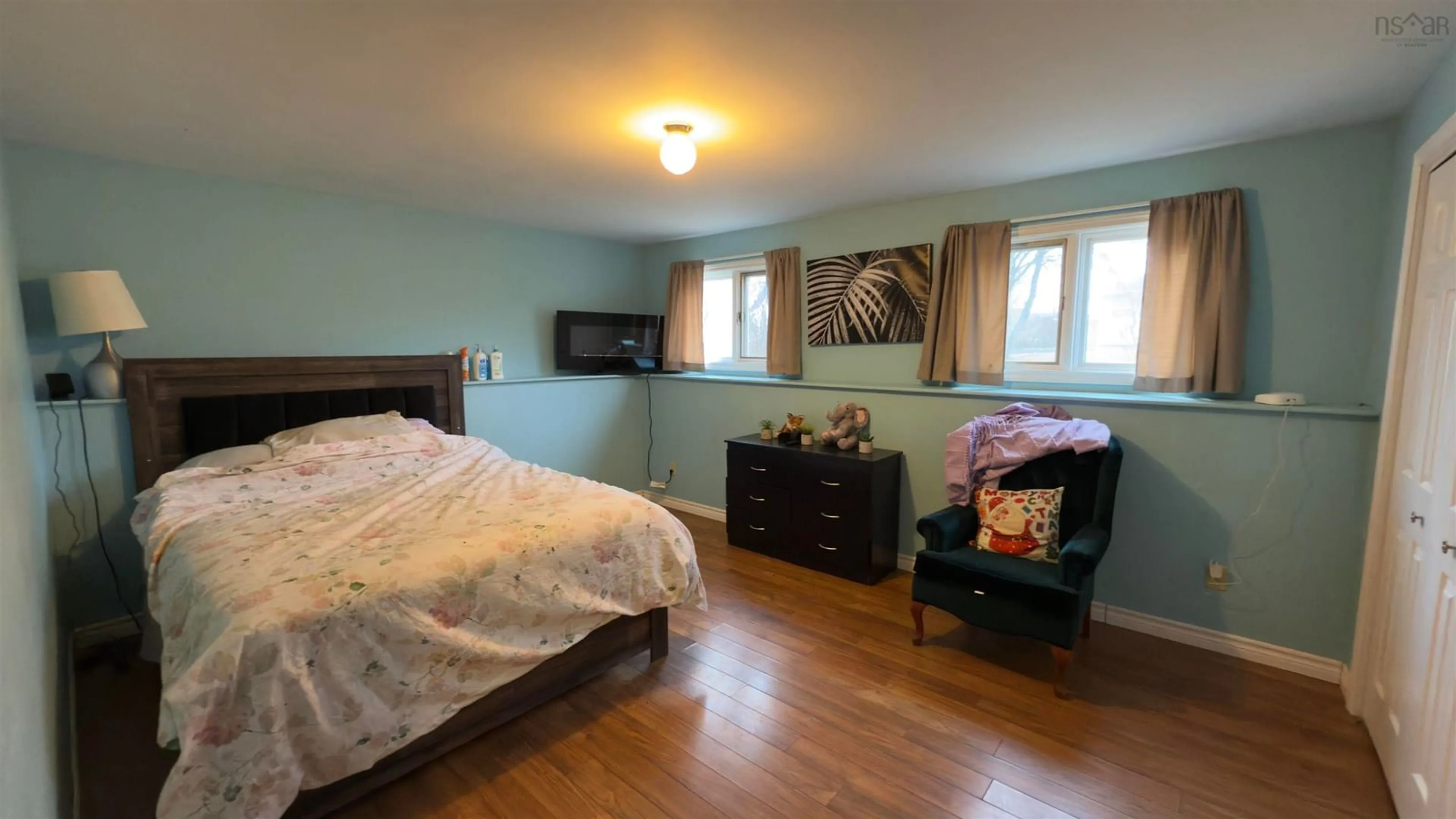 Bedroom with bed, wood/laminate floor for 59 Porter St, Yarmouth Nova Scotia B5A 2Y8