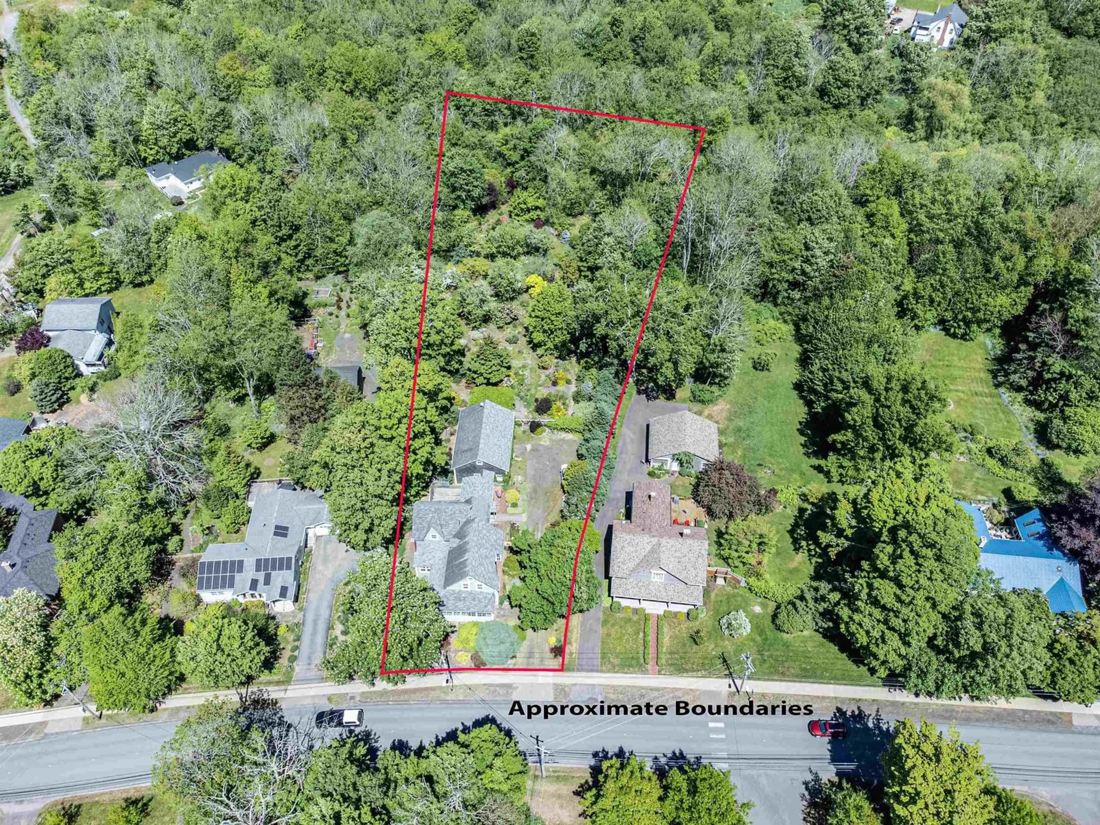 A pic from outside/outdoor area/front of a property/back of a property/a pic from drone, forest/trees view for 800 St George St, Annapolis Royal Nova Scotia B0S 1A0