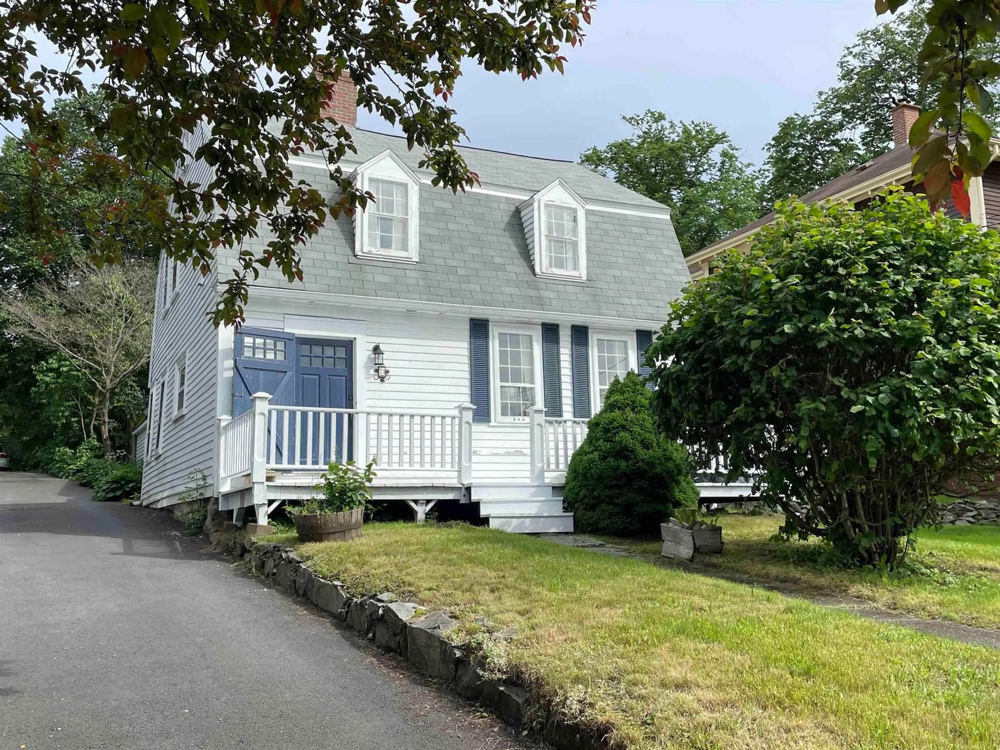 Home with vinyl exterior material, street for 71 Main St, Liverpool Nova Scotia B0T 1K0