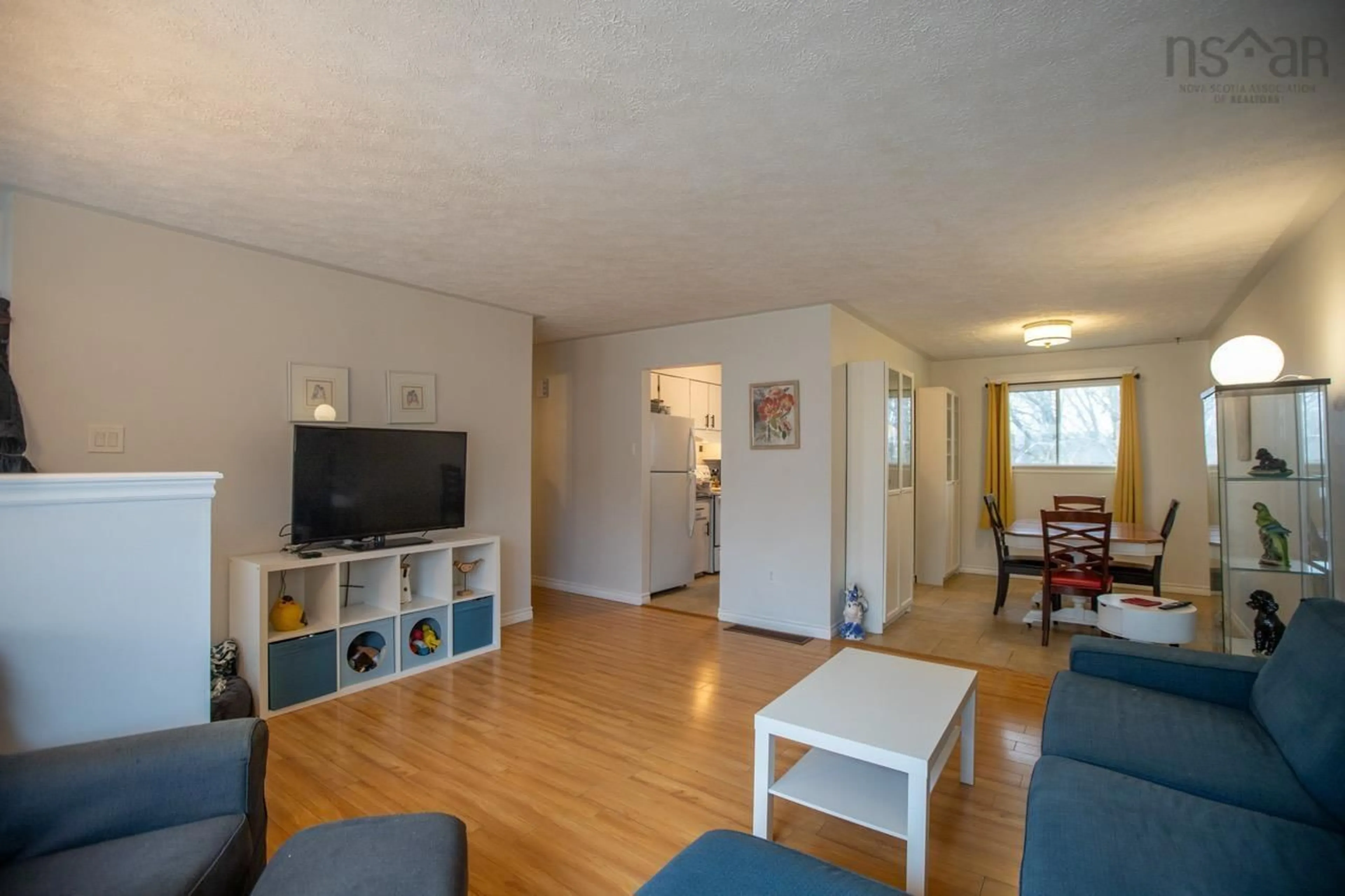 Living room with furniture, wood/laminate floor for 93 Nestor Cres, Cole Harbour Nova Scotia B2W 4V6