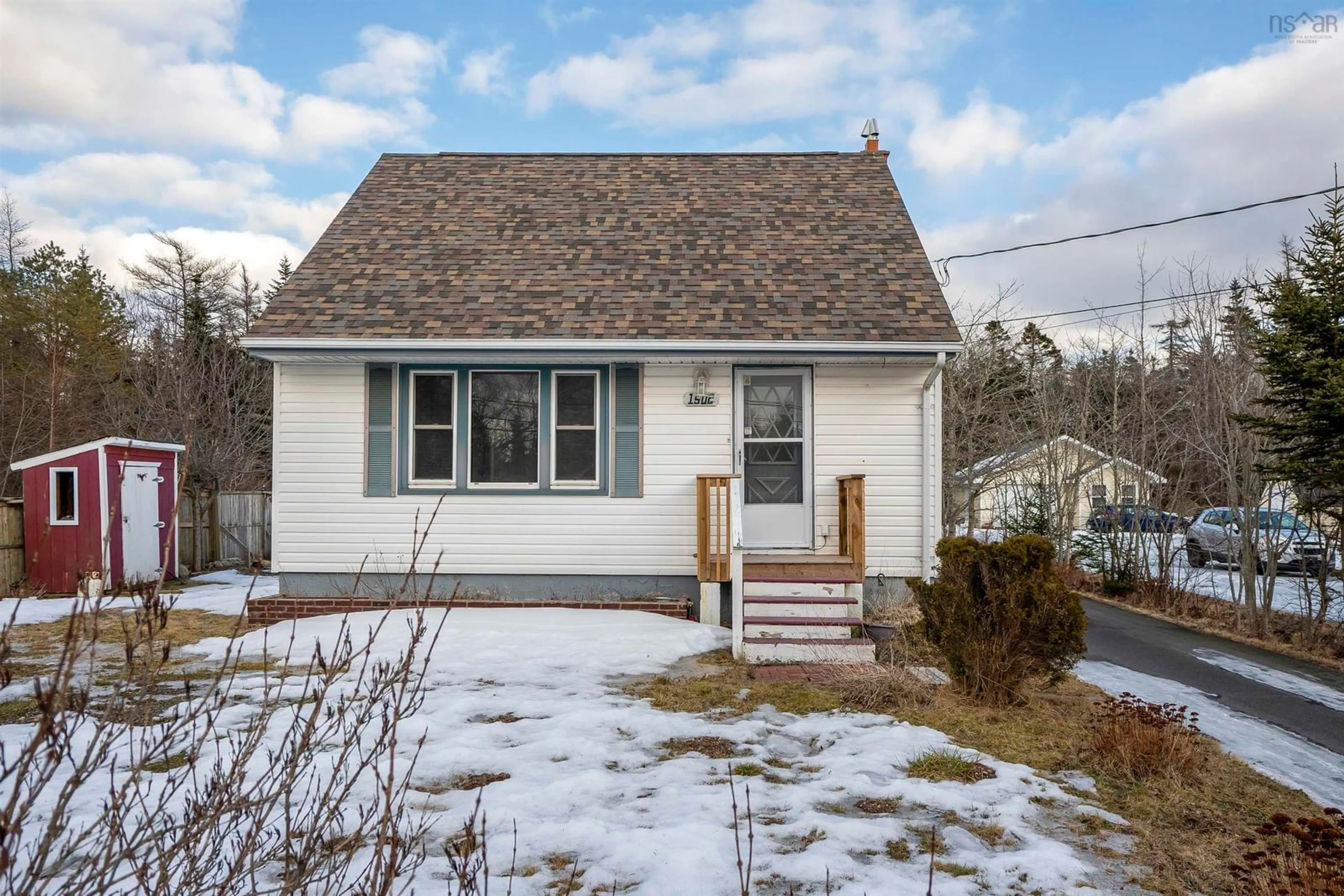 Home with vinyl exterior material, street for 1502 Prospect Rd, Hatchet Lake Nova Scotia B3T 1P7