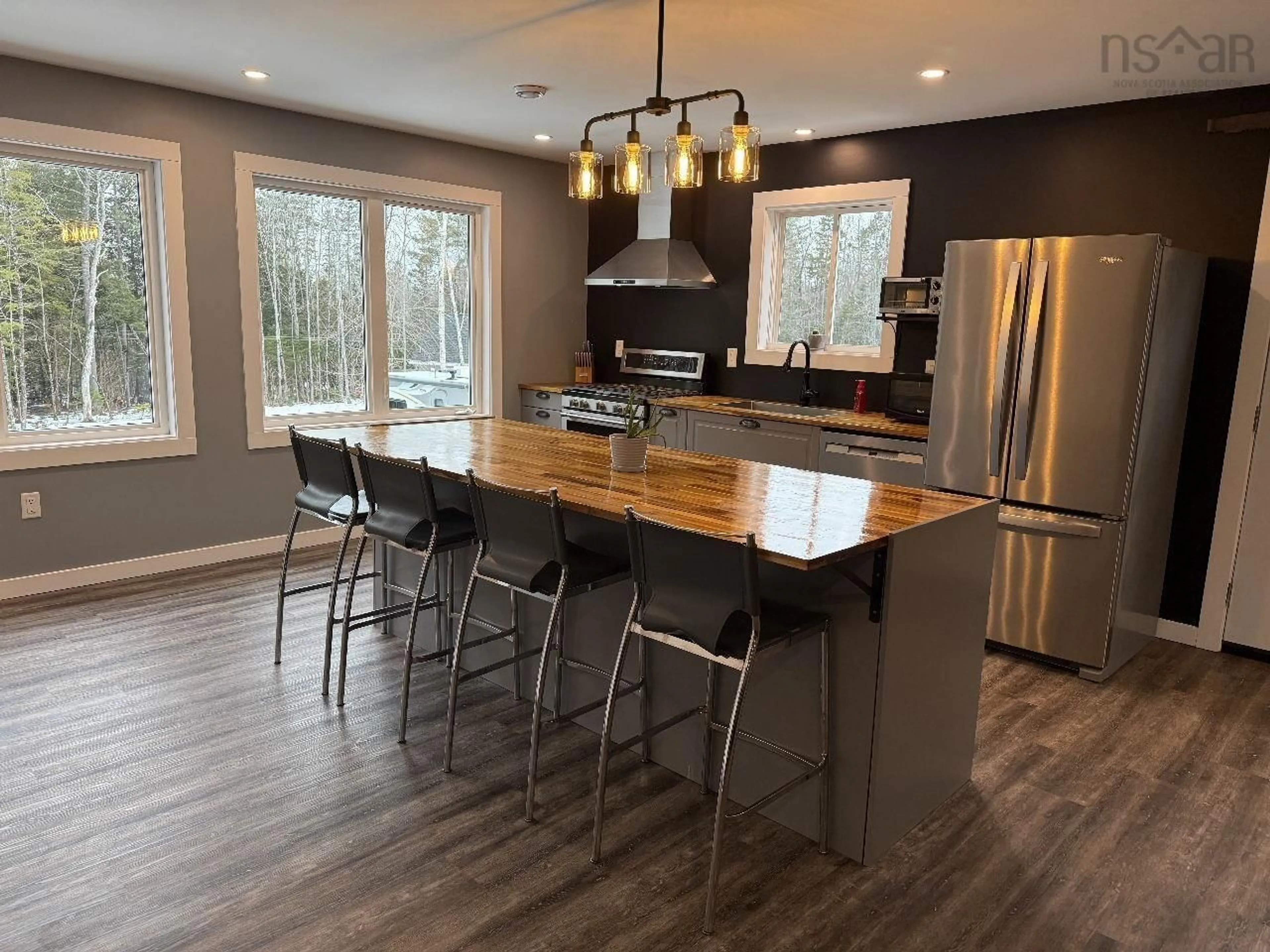 Open concept kitchen, wood/laminate floor for 16 Robyn Dr, Nine Mile River Nova Scotia B2S 2T3