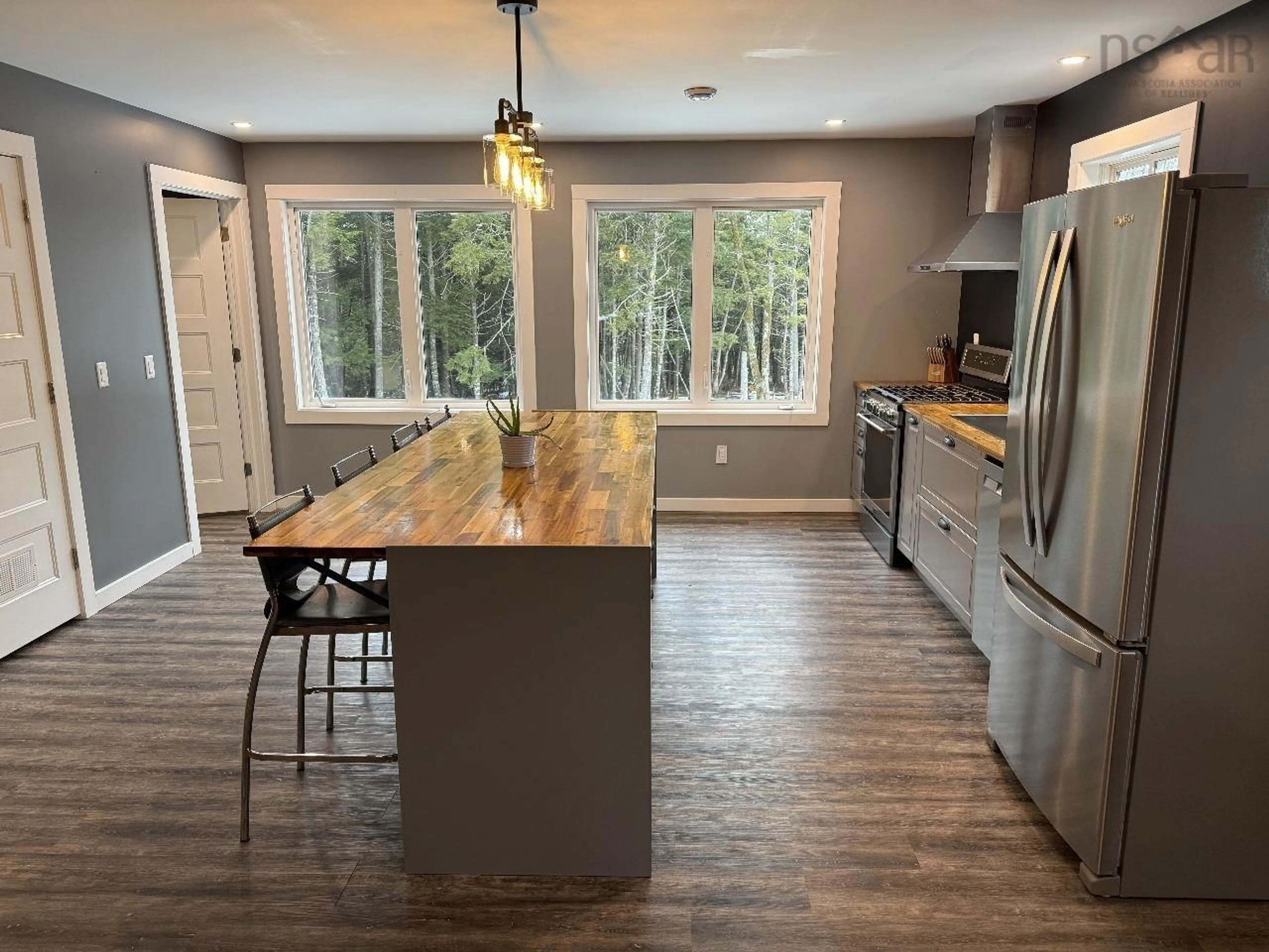 Open concept kitchen, wood/laminate floor for 16 Robyn Dr, Nine Mile River Nova Scotia B2S 2T3