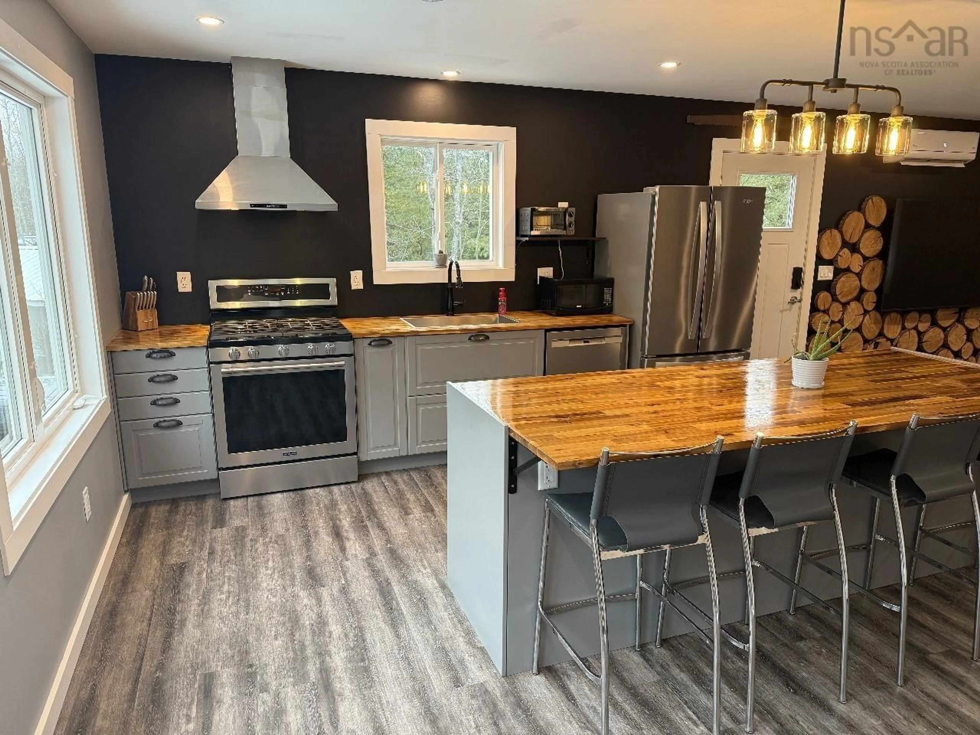 Open concept kitchen, wood/laminate floor for 16 Robyn Dr, Nine Mile River Nova Scotia B2S 2T3