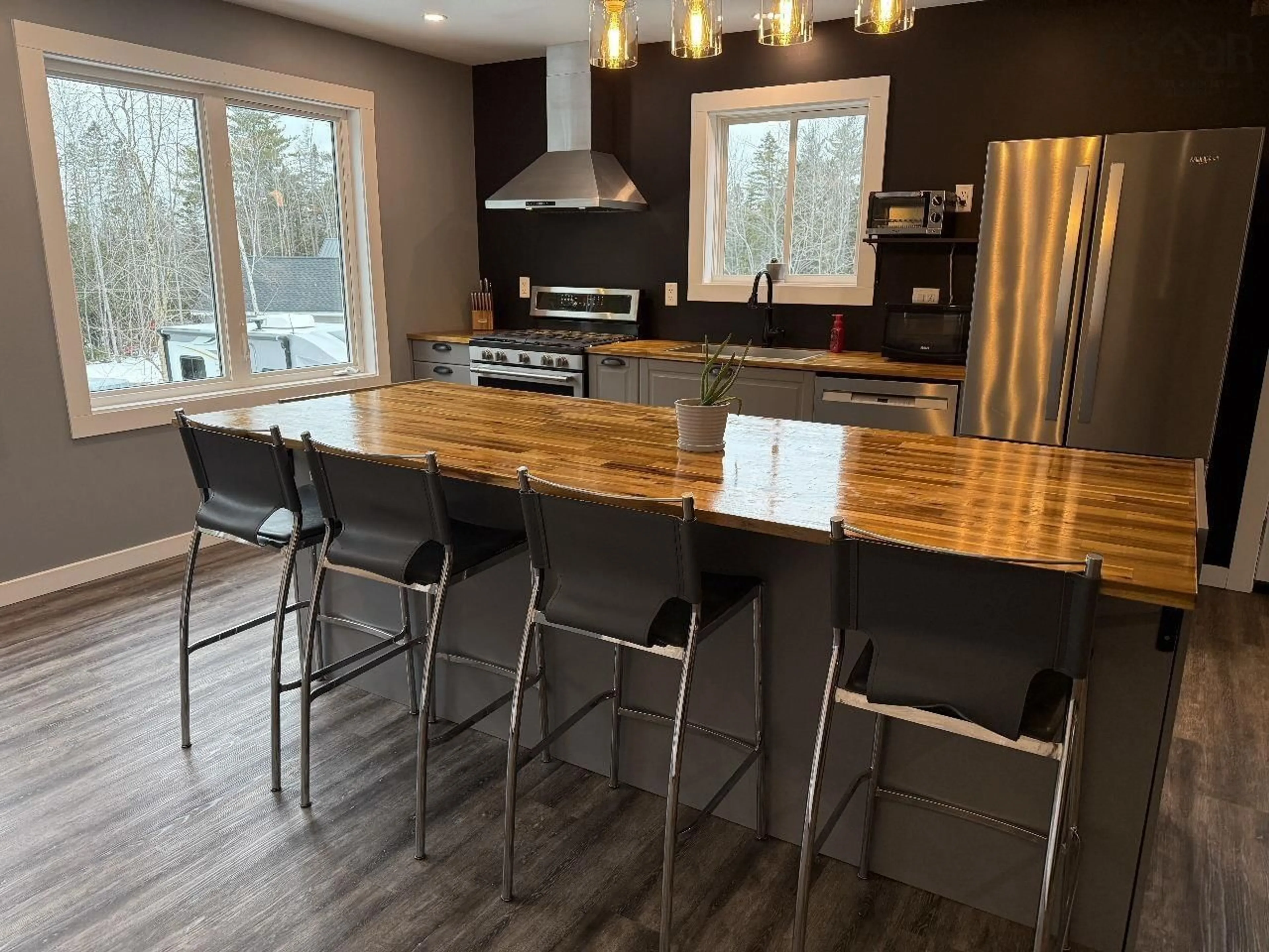 Open concept kitchen, wood/laminate floor for 16 Robyn Dr, Nine Mile River Nova Scotia B2S 2T3