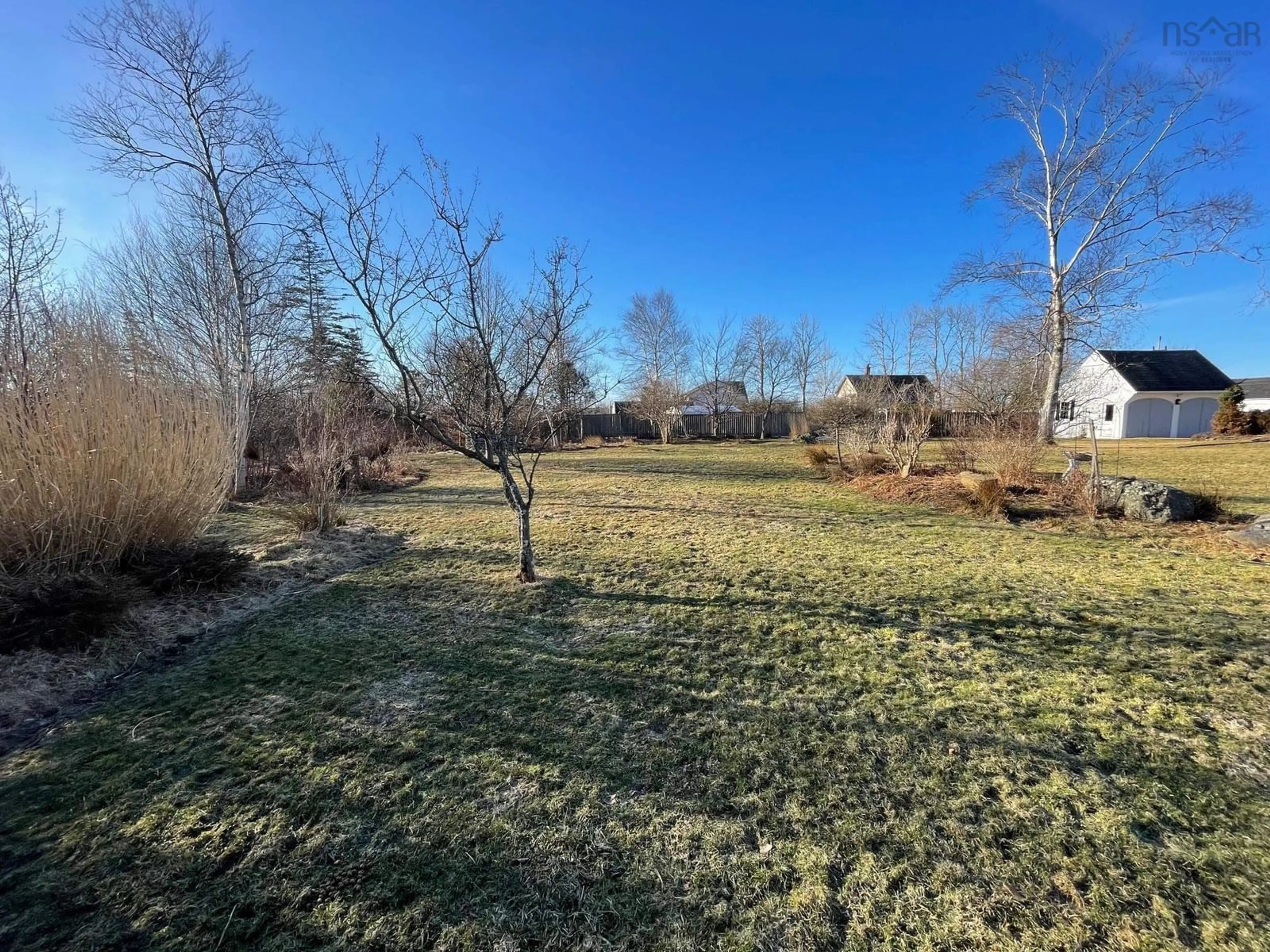 A pic from outside/outdoor area/front of a property/back of a property/a pic from drone, forest/trees view for 35 Clements Ave, Yarmouth Nova Scotia B5A 2L6