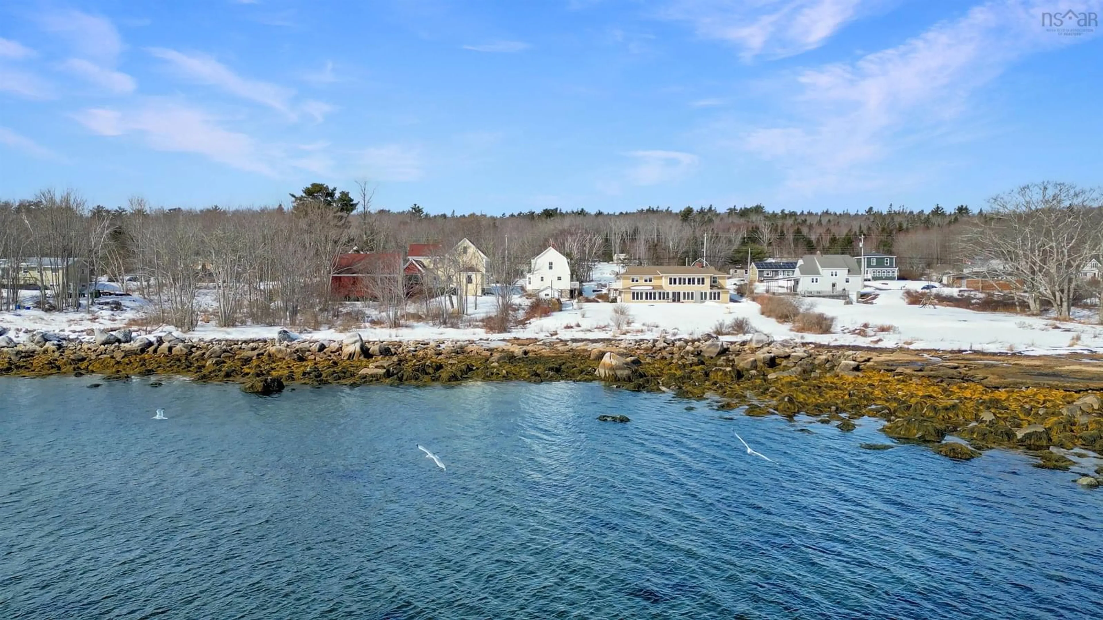 A pic from outside/outdoor area/front of a property/back of a property/a pic from drone, water/lake/river/ocean view for 8495 Highway 3, Port Mouton Nova Scotia B0T 1T0