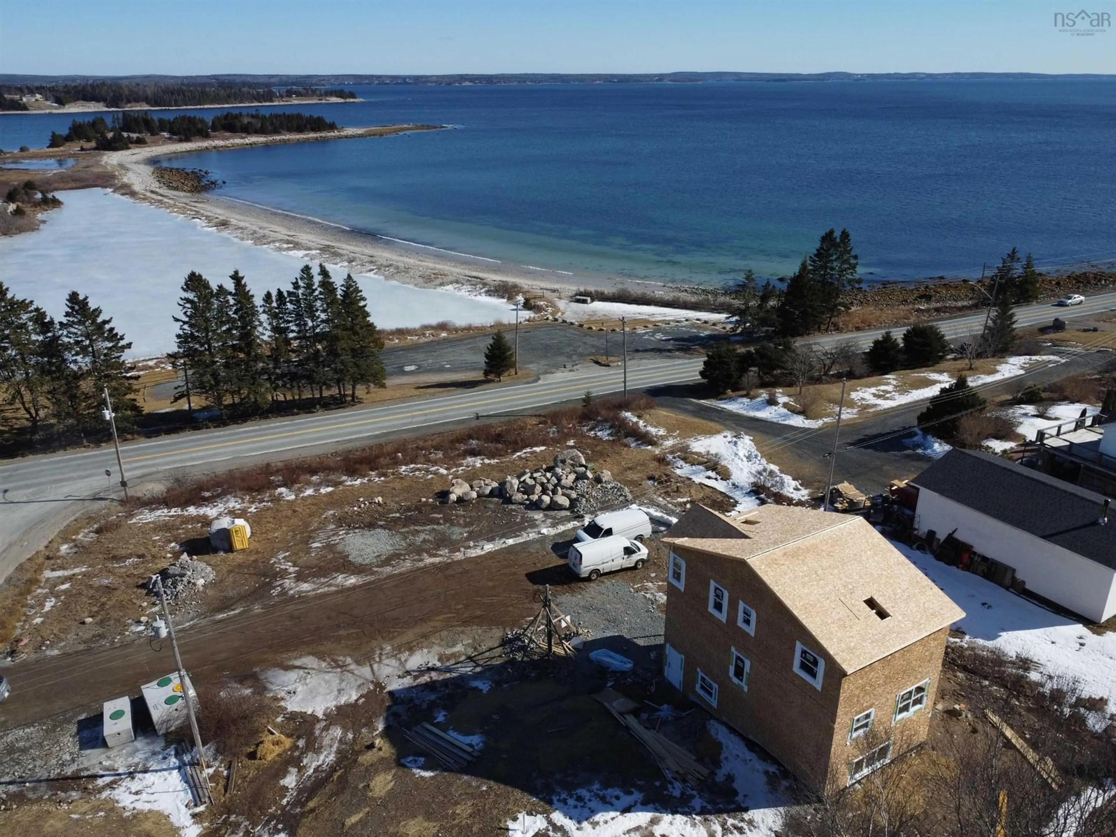 A pic from outside/outdoor area/front of a property/back of a property/a pic from drone, water/lake/river/ocean view for 1 Brigleys Rd, Queensland Nova Scotia B0J 1T0