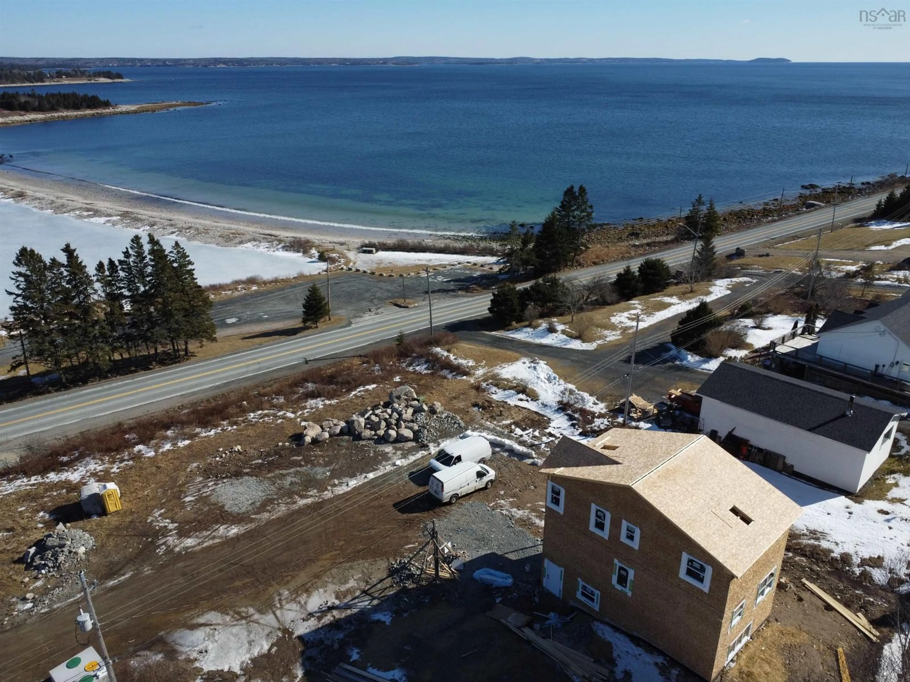 A pic from outside/outdoor area/front of a property/back of a property/a pic from drone, water/lake/river/ocean view for 1 Brigleys Rd, Queensland Nova Scotia B0J 1T0