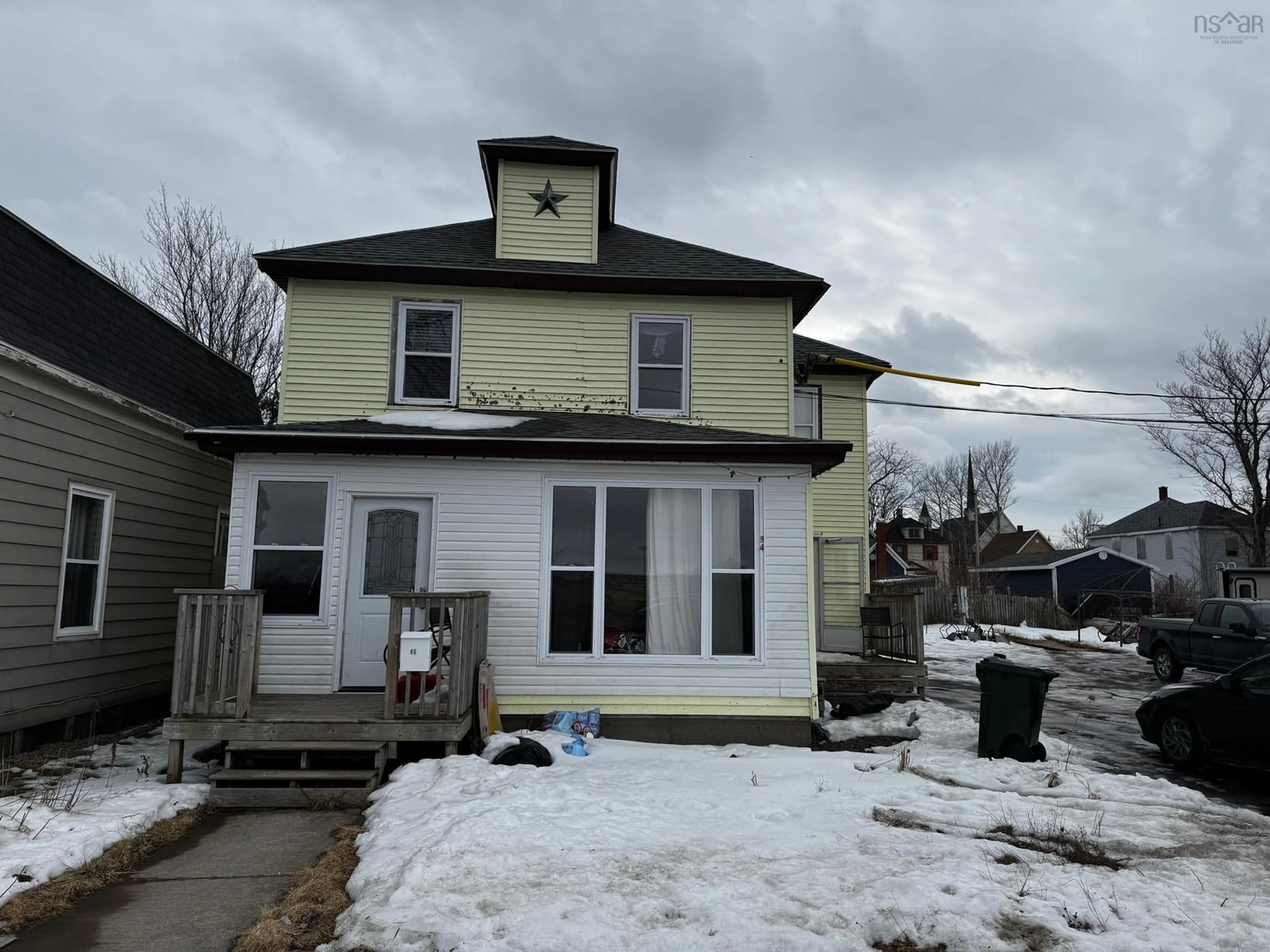 A pic from outside/outdoor area/front of a property/back of a property/a pic from drone, street for 84 Intercolonial St, Sydney Nova Scotia B1P 1S6