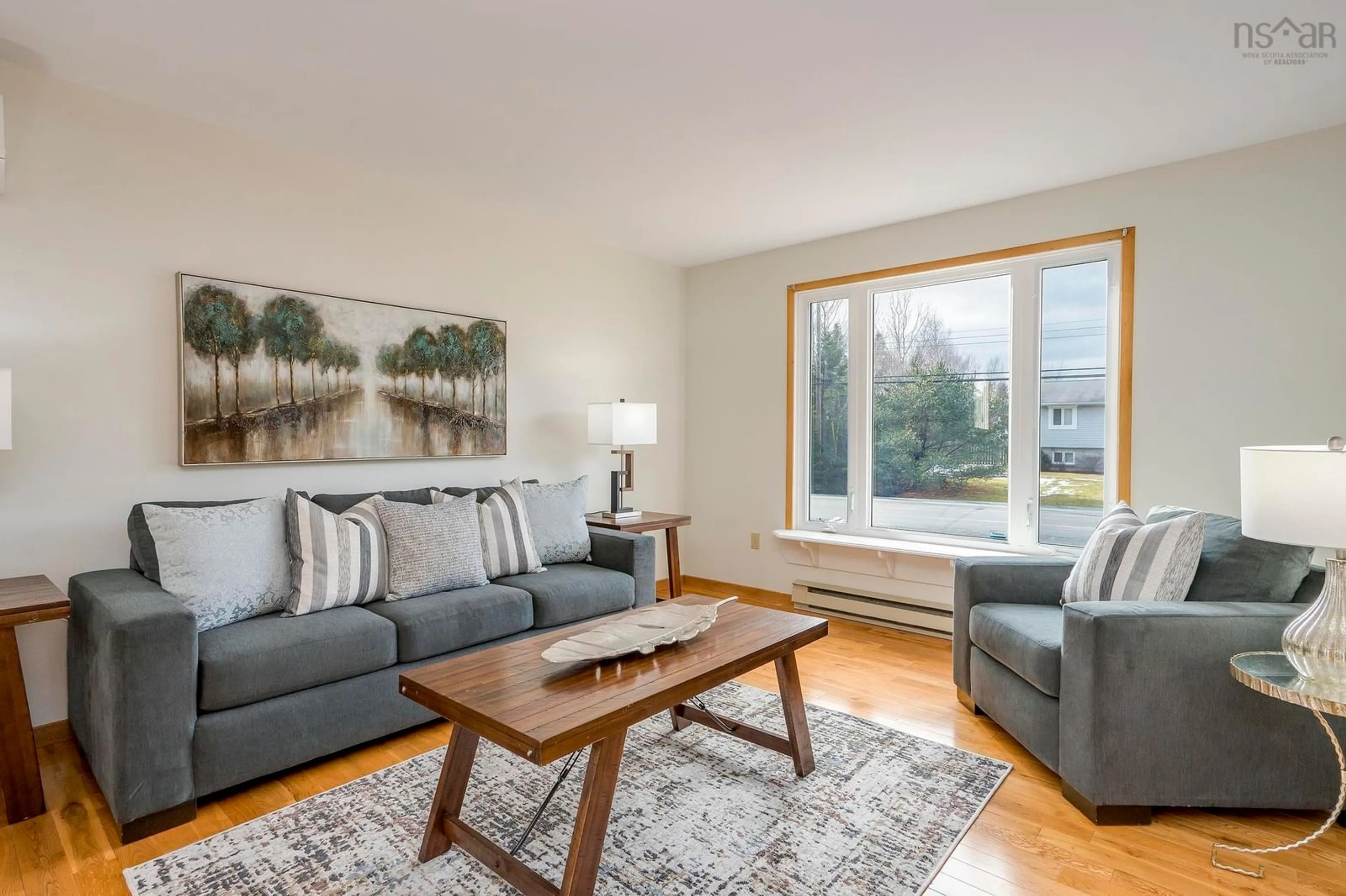 Living room with furniture, wood/laminate floor for 155 Doherty Dr, Lawrencetown Nova Scotia B2Z 1C8