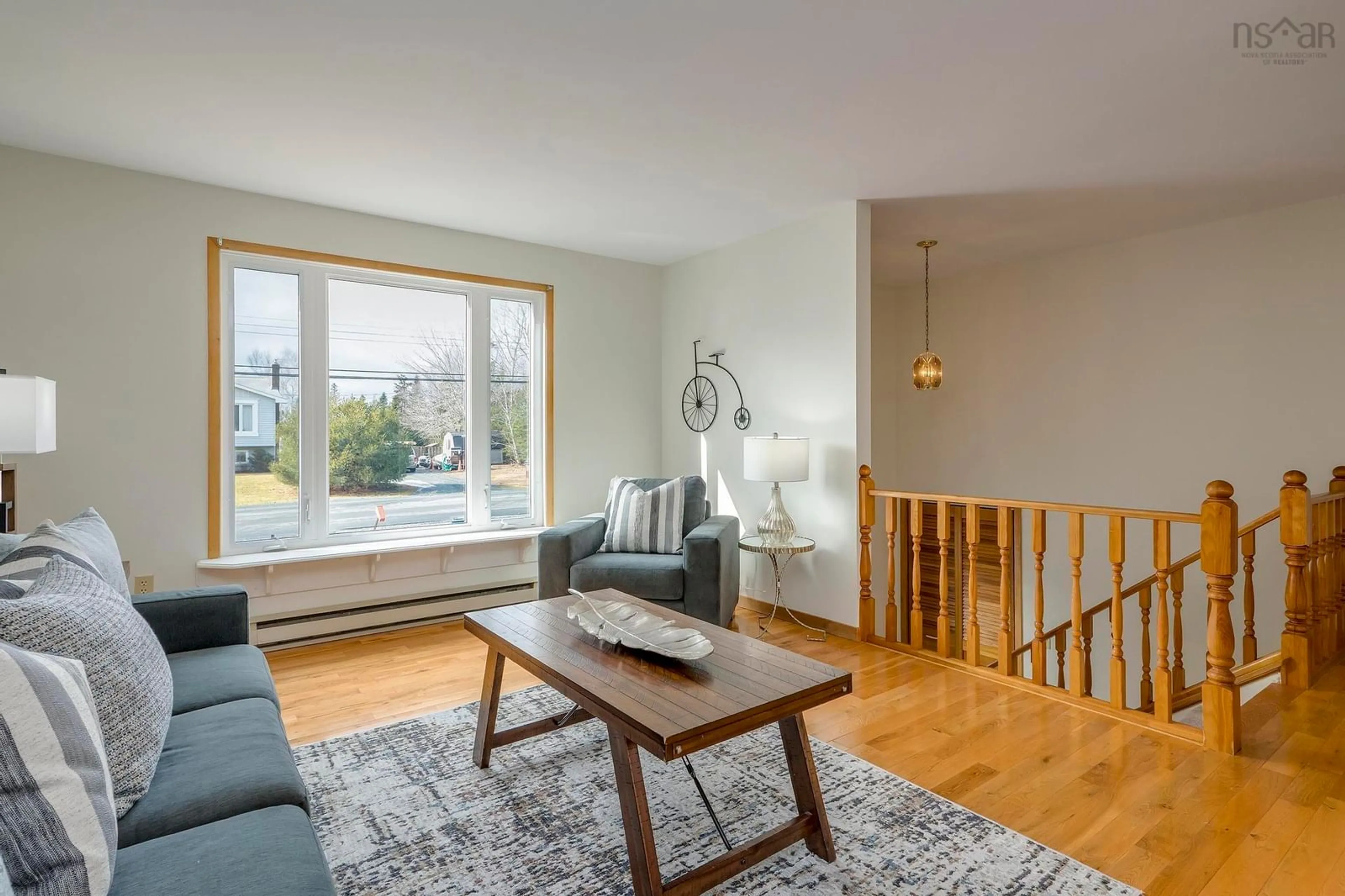 Living room with furniture, wood/laminate floor for 155 Doherty Dr, Lawrencetown Nova Scotia B2Z 1C8