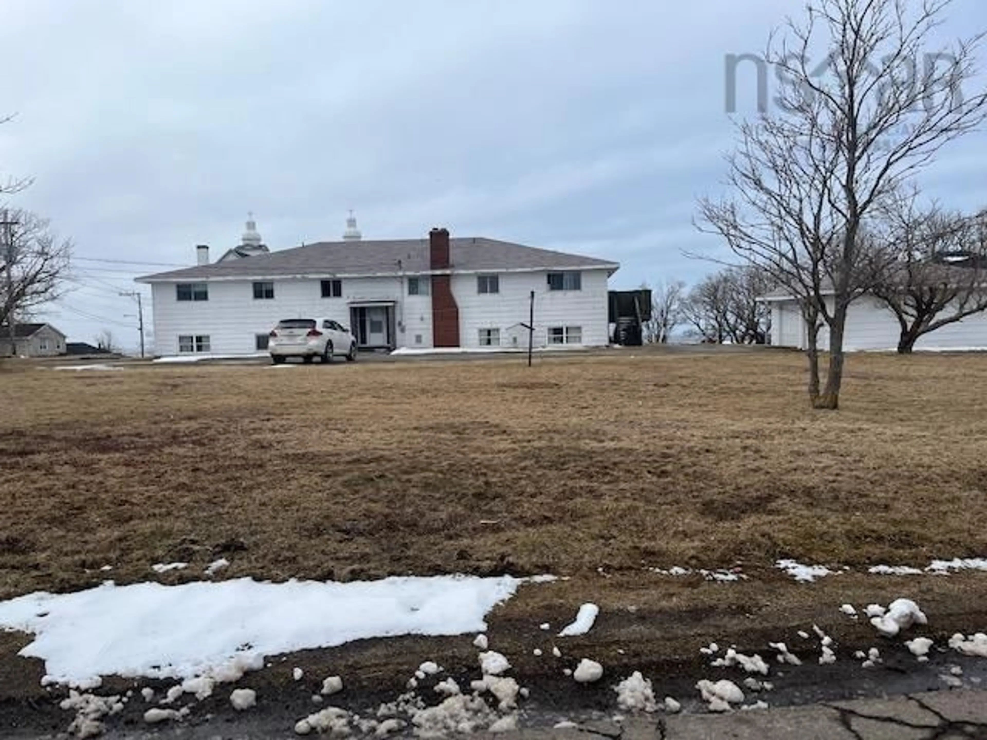 A pic from outside/outdoor area/front of a property/back of a property/a pic from drone, unknown for 47 Upper Railway St, Inverness Nova Scotia B0E 1N0