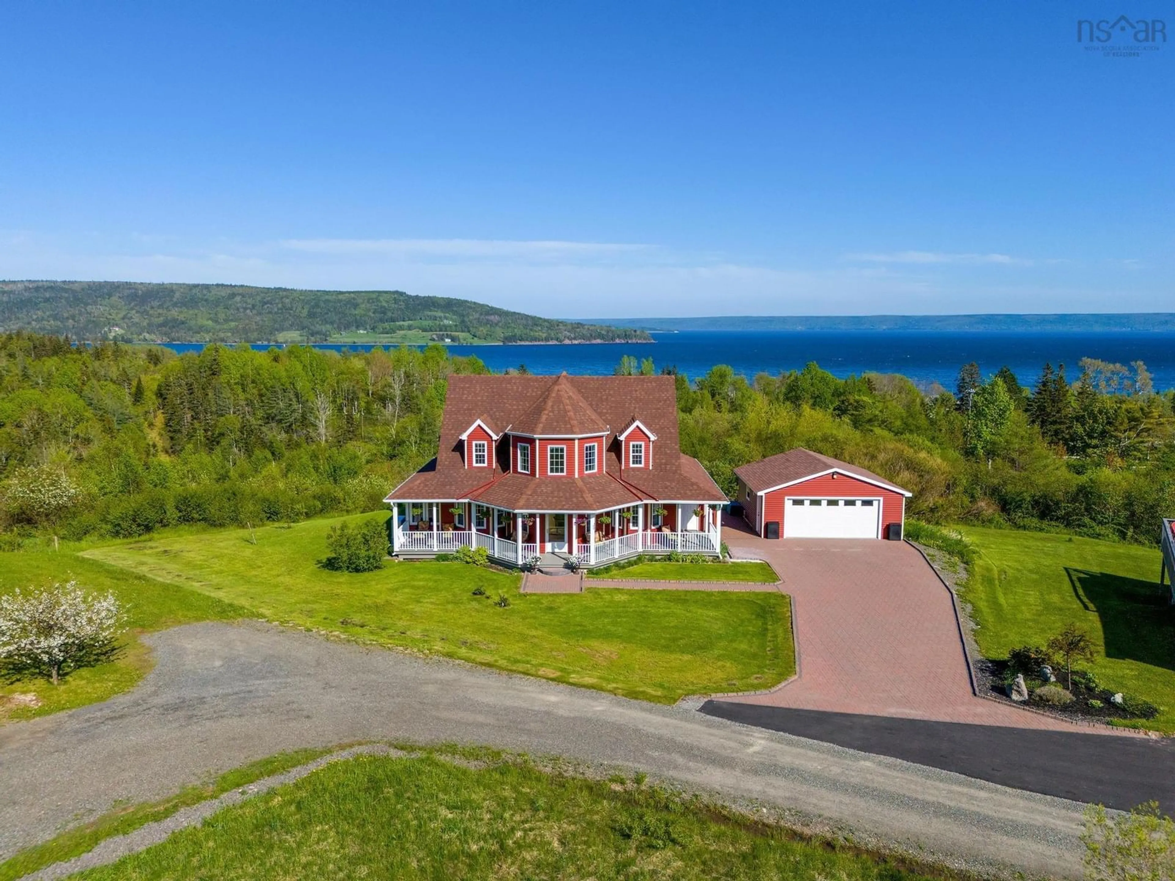 A pic from outside/outdoor area/front of a property/back of a property/a pic from drone, water/lake/river/ocean view for 20 Harvey Dr, Baddeck Nova Scotia B0E 1B0