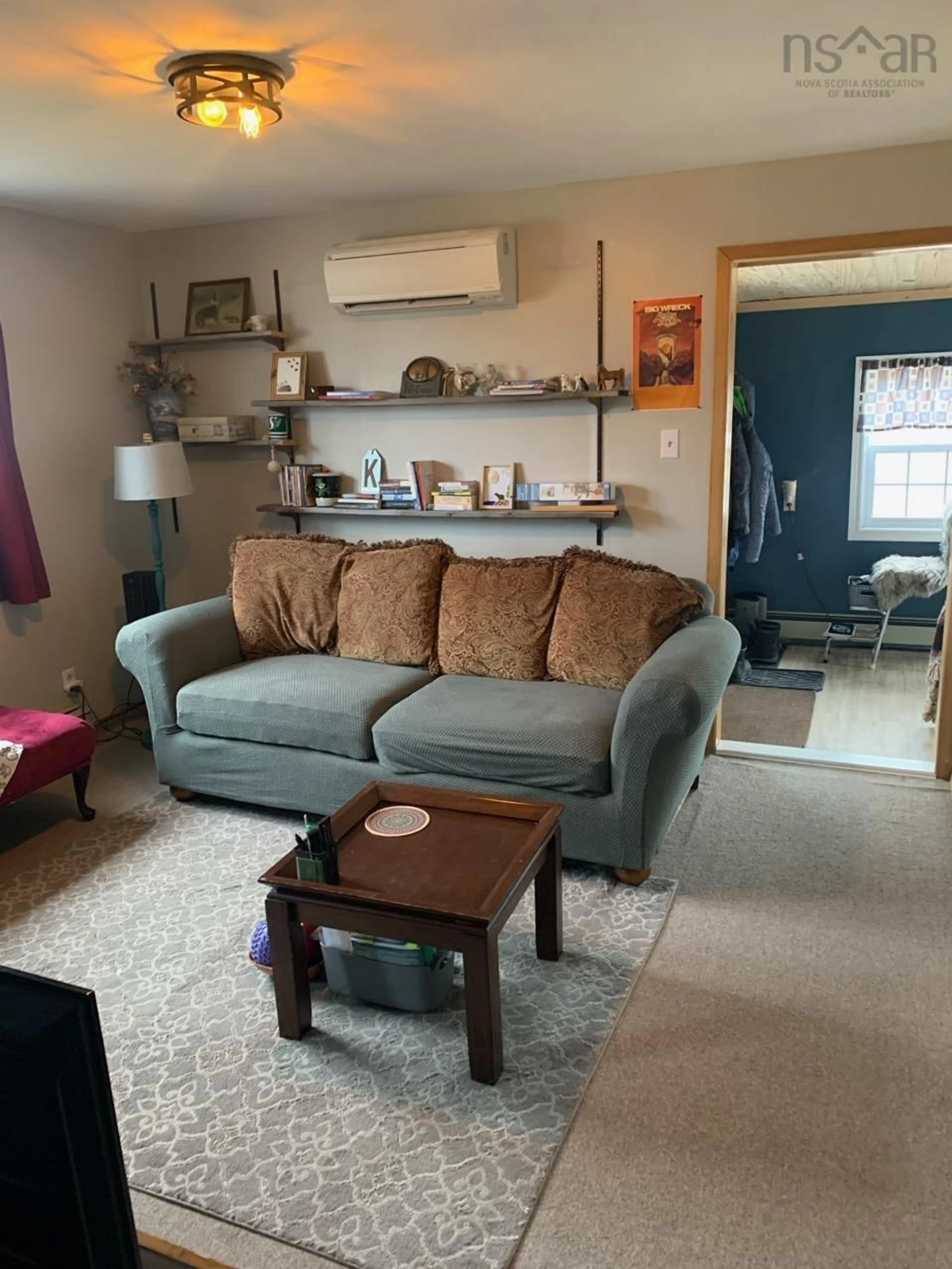 Living room with furniture, unknown for 16 Queen St, Scotchtown Nova Scotia B1H 1E8