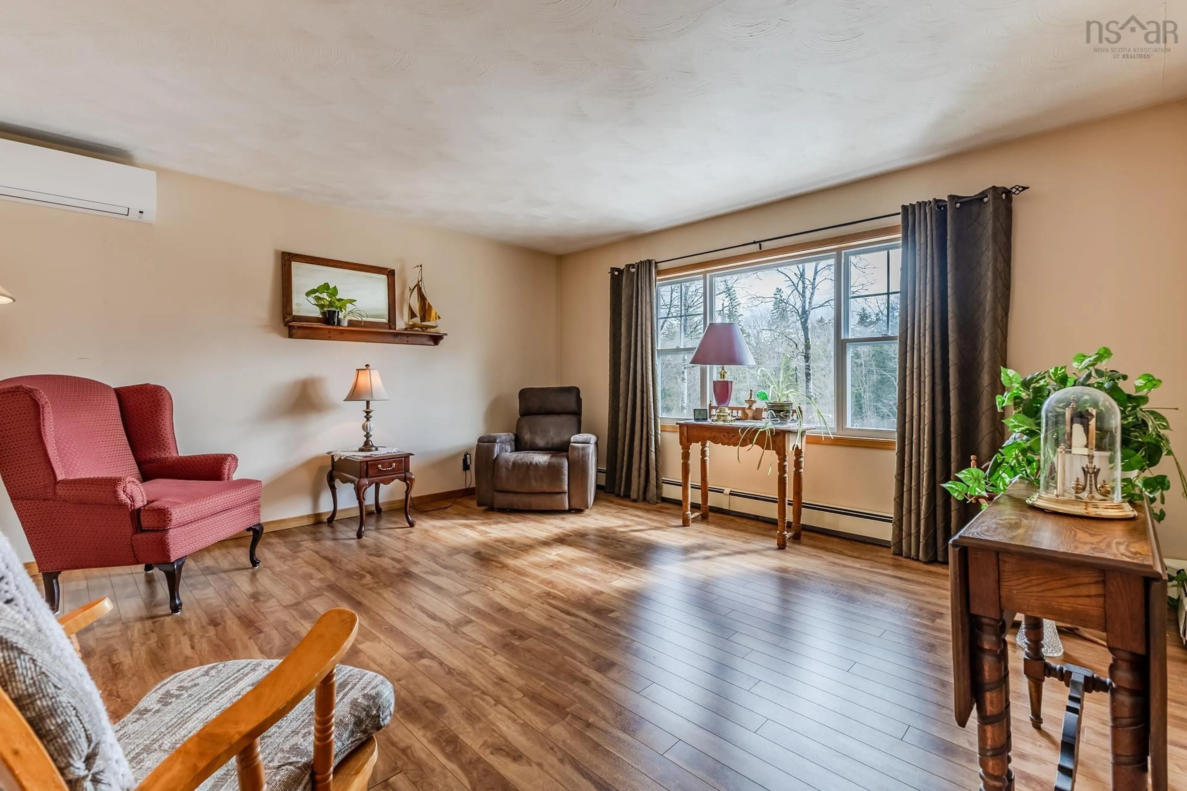 Living room with furniture, wood/laminate floor for 239 Pumping Station Rd, Brookdale Nova Scotia B4H 3Y3