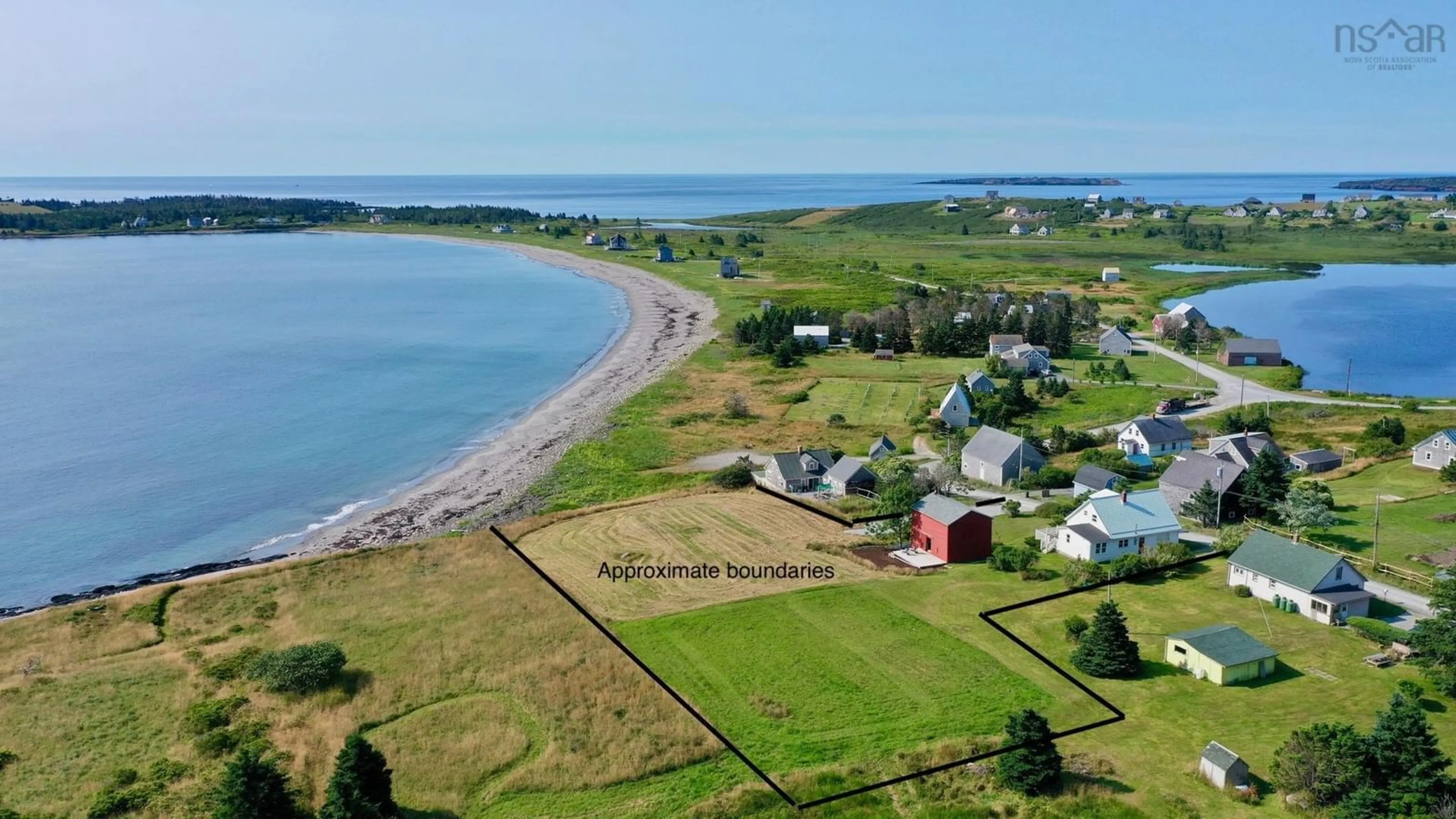 A pic from outside/outdoor area/front of a property/back of a property/a pic from drone, water/lake/river/ocean view for 85 Mosher Rd, Kingsburg Nova Scotia B0J 2C0