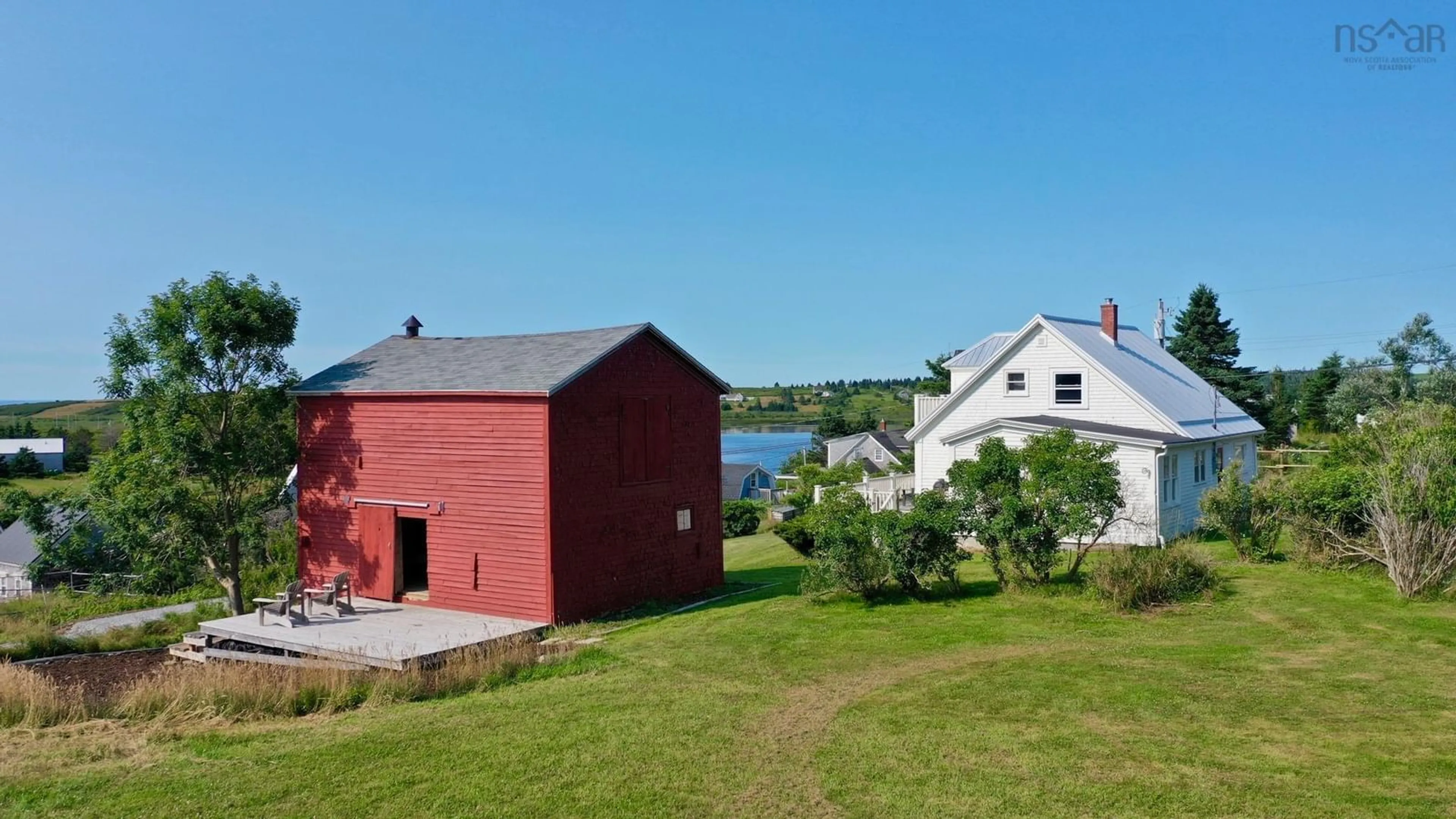 A pic from outside/outdoor area/front of a property/back of a property/a pic from drone, water/lake/river/ocean view for 85 Mosher Rd, Kingsburg Nova Scotia B0J 2C0