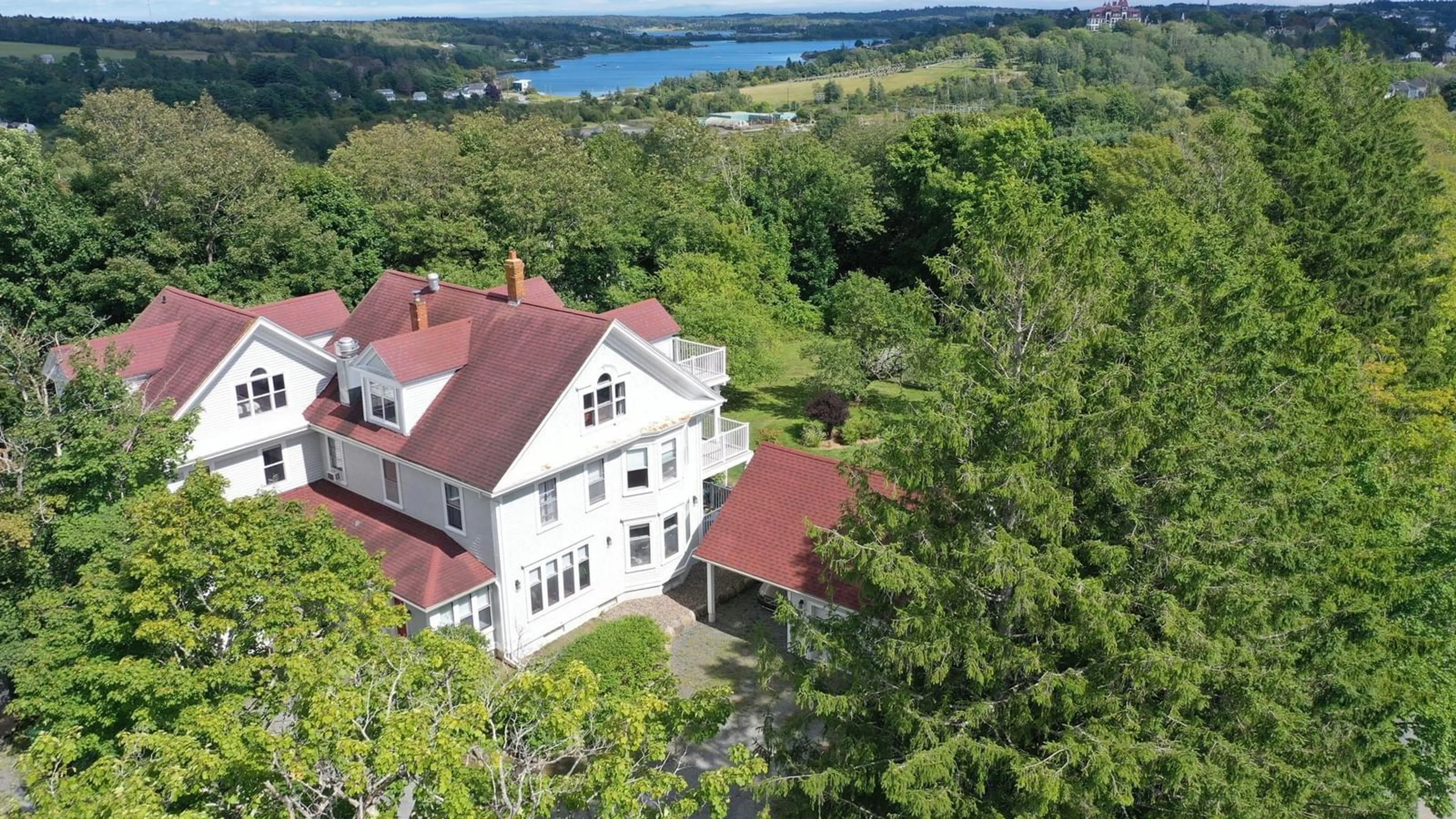 A pic from outside/outdoor area/front of a property/back of a property/a pic from drone, water/lake/river/ocean view for 216 Dufferin St, Lunenburg Nova Scotia B0J 2C0