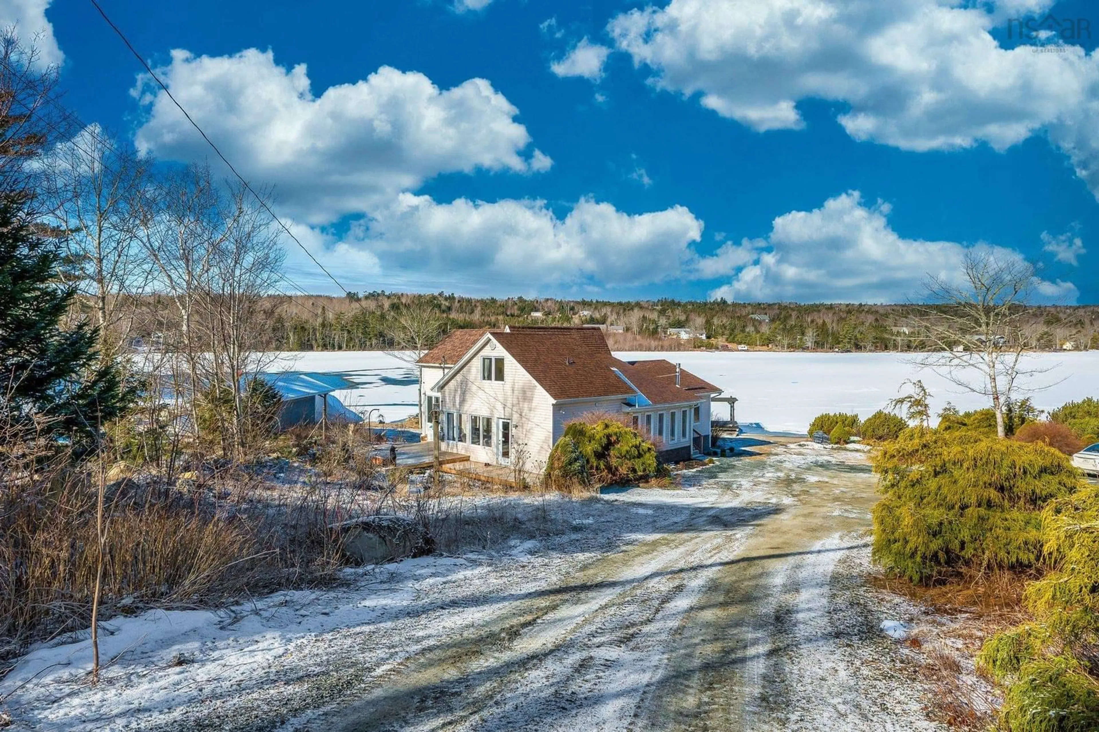 A pic from outside/outdoor area/front of a property/back of a property/a pic from drone, water/lake/river/ocean view for 110 Whisper Ridge, Porters Lake Nova Scotia B3E 1J6