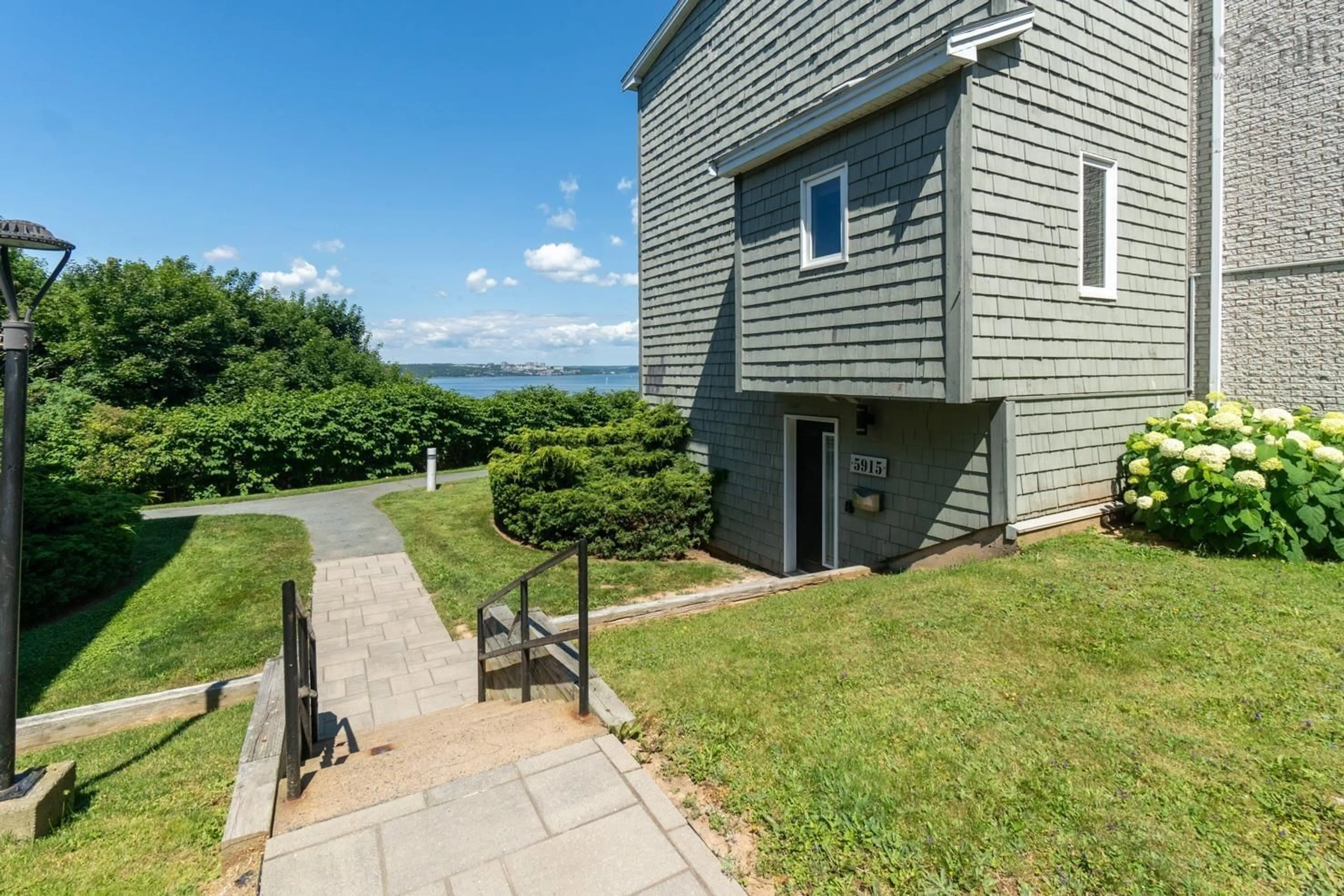 A pic from outside/outdoor area/front of a property/back of a property/a pic from drone, water/lake/river/ocean view for 5915 Gainsborough Pl, Halifax Nova Scotia B3K 5R8