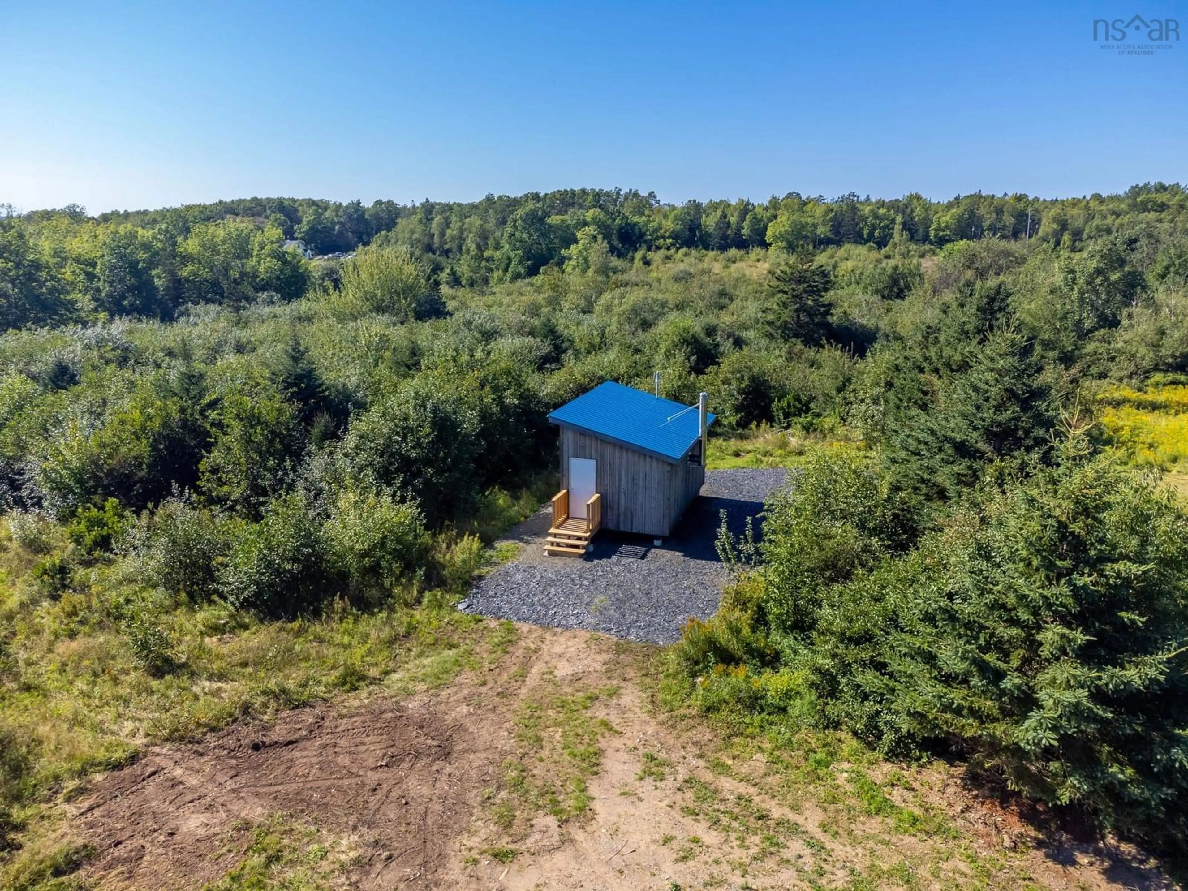 A pic from outside/outdoor area/front of a property/back of a property/a pic from drone, forest/trees view for 440 Purdy Rd, Waldeck West Nova Scotia B0S 1J0