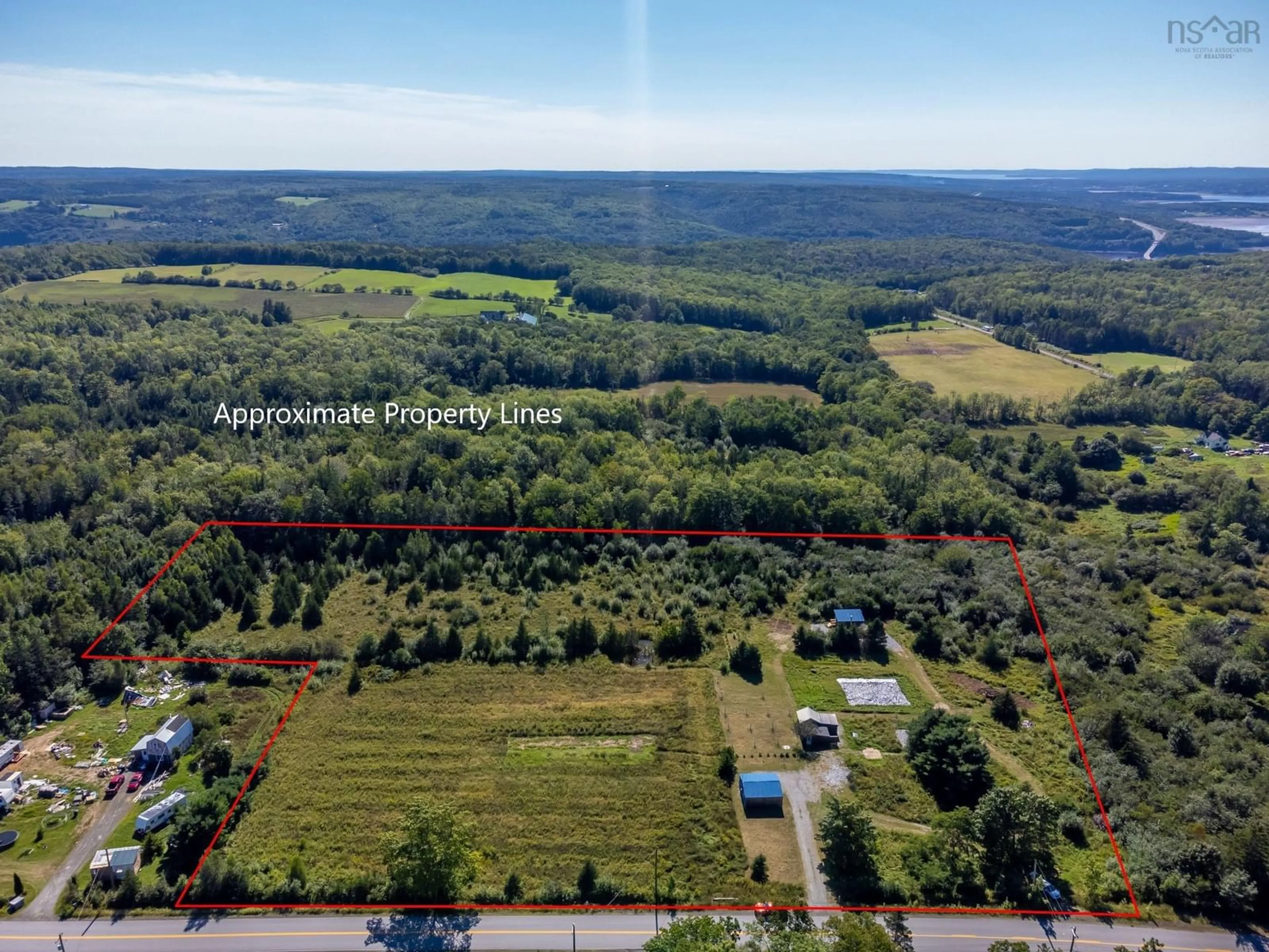A pic from outside/outdoor area/front of a property/back of a property/a pic from drone, forest/trees view for 440 Purdy Rd, Waldeck West Nova Scotia B0S 1J0