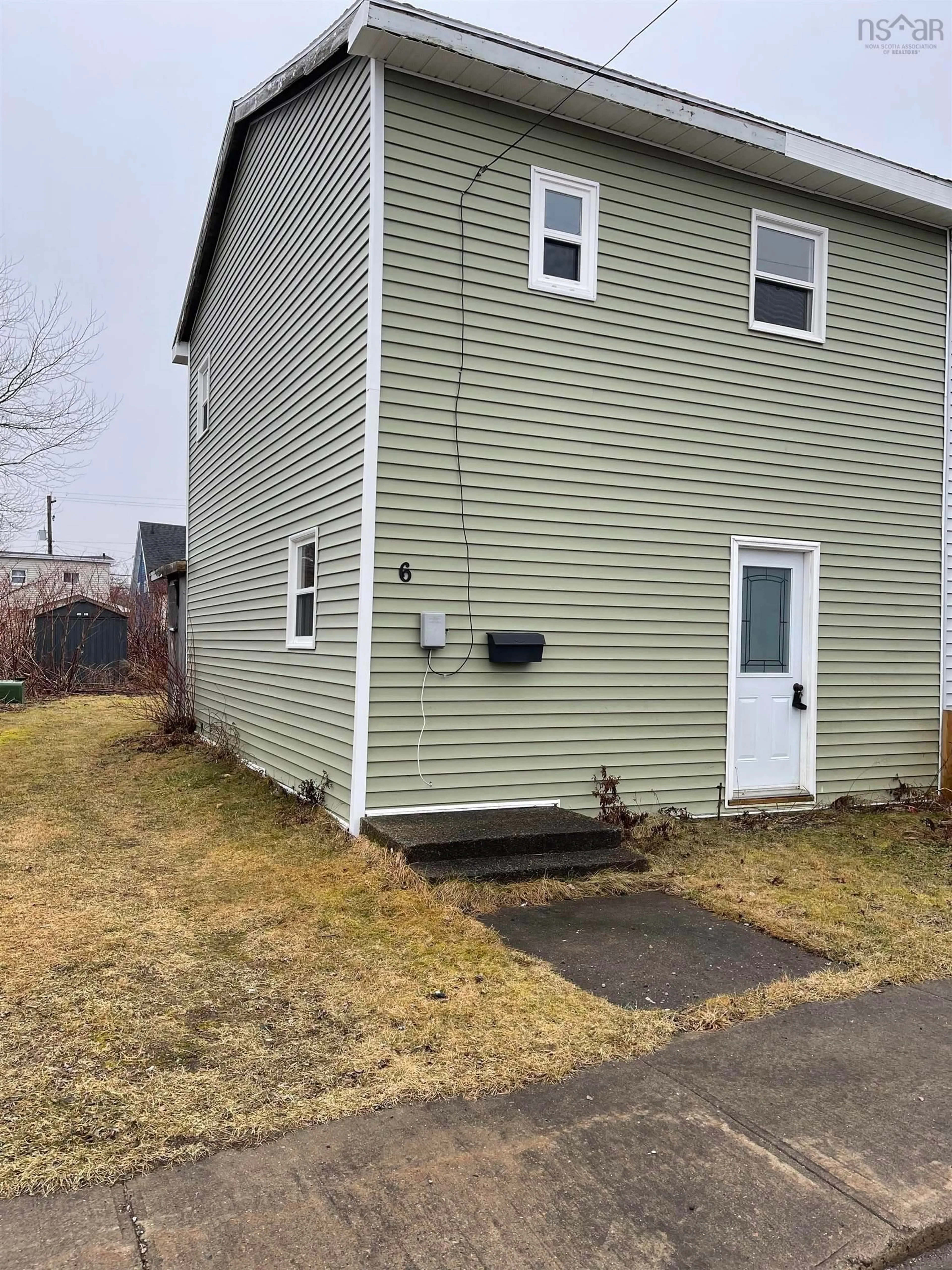 Home with vinyl exterior material, street for 6 Catherine St, North Sydney Nova Scotia B2A 2G7