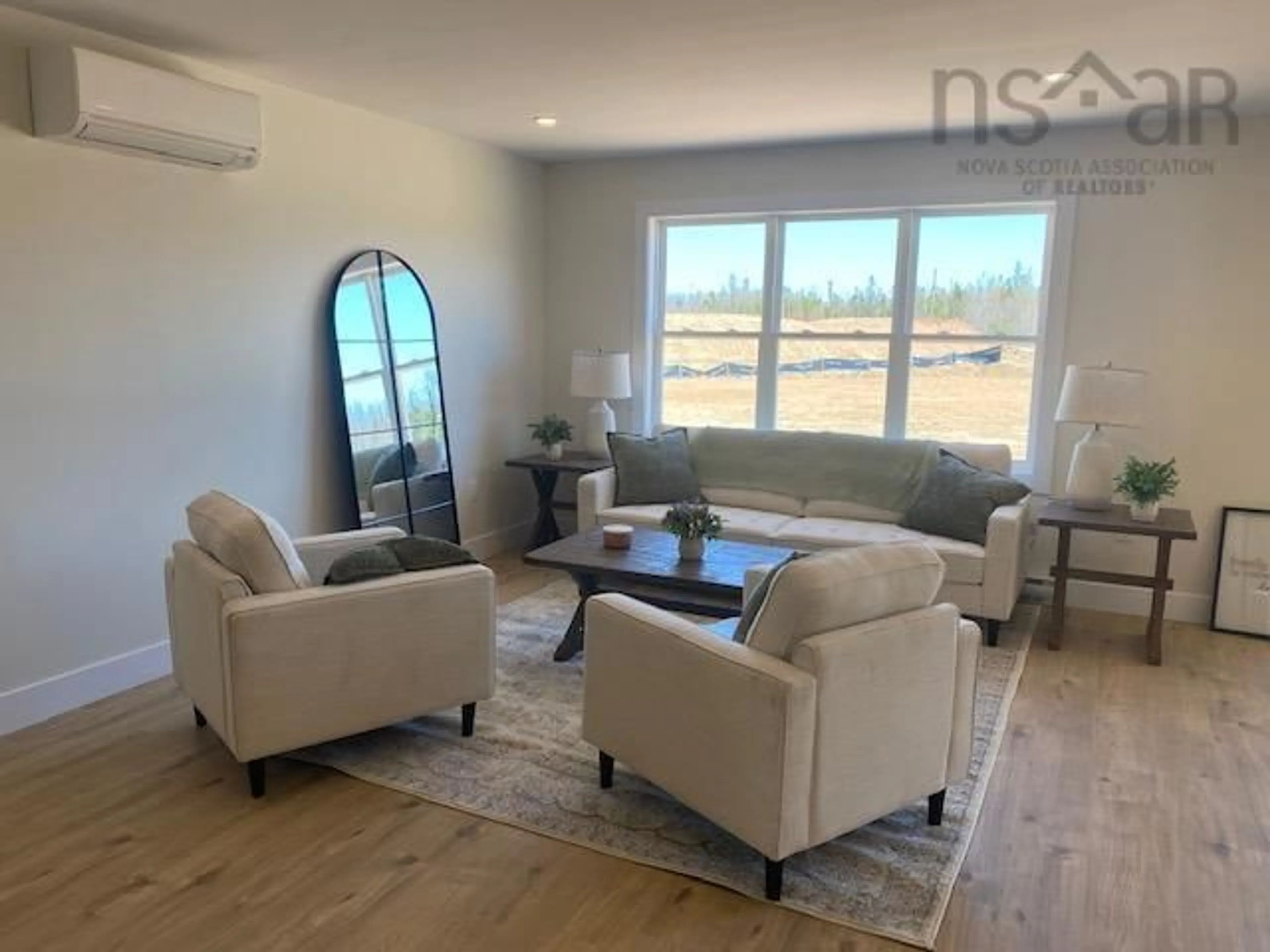 Living room with furniture, wood/laminate floor for Jessome Ave #Lot 113A, Lantz Nova Scotia B2S 0C5