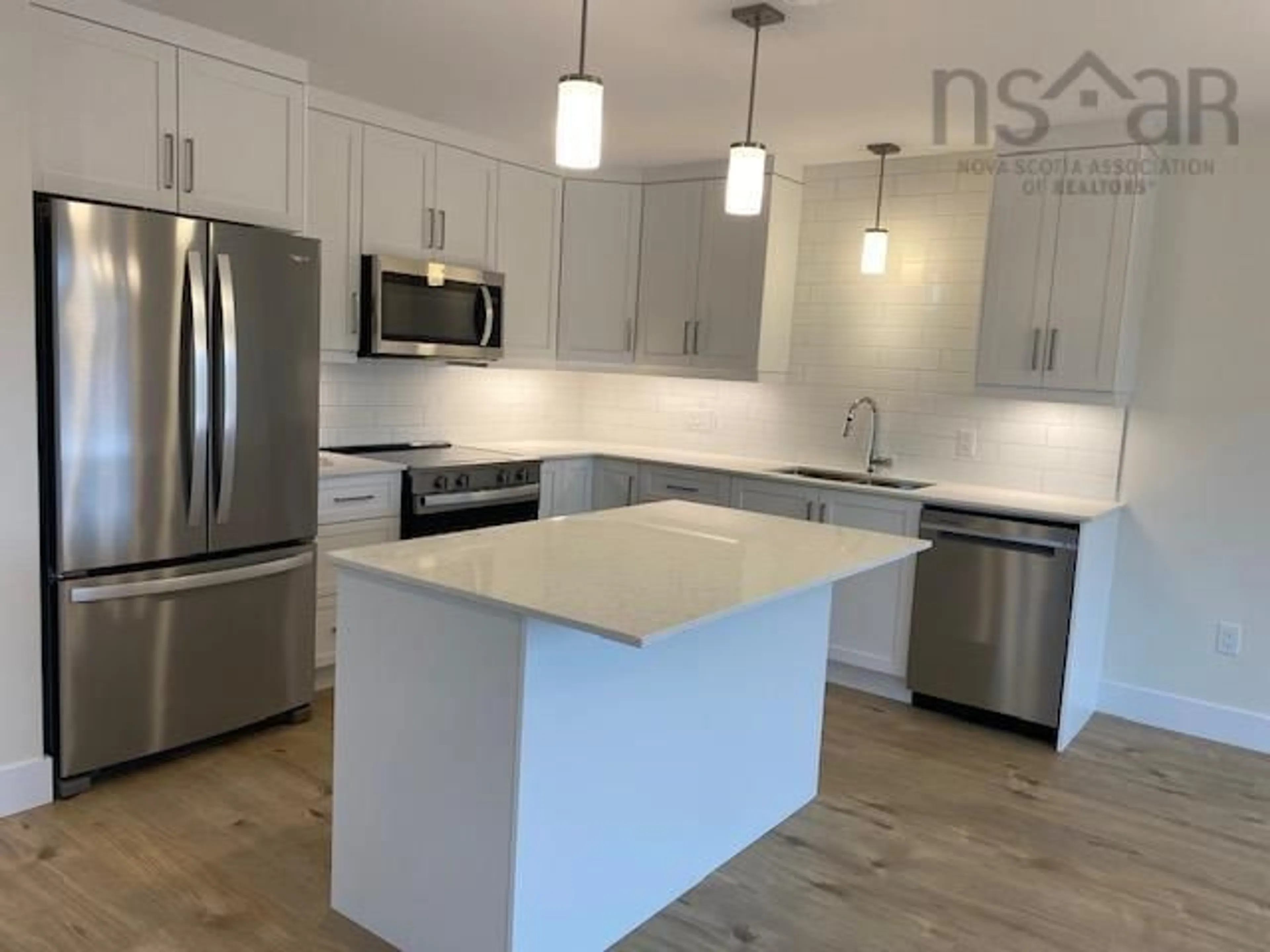 Open concept kitchen, wood/laminate floor for Jessome Ave #Lot 113B, Lantz Nova Scotia B2S 0C5
