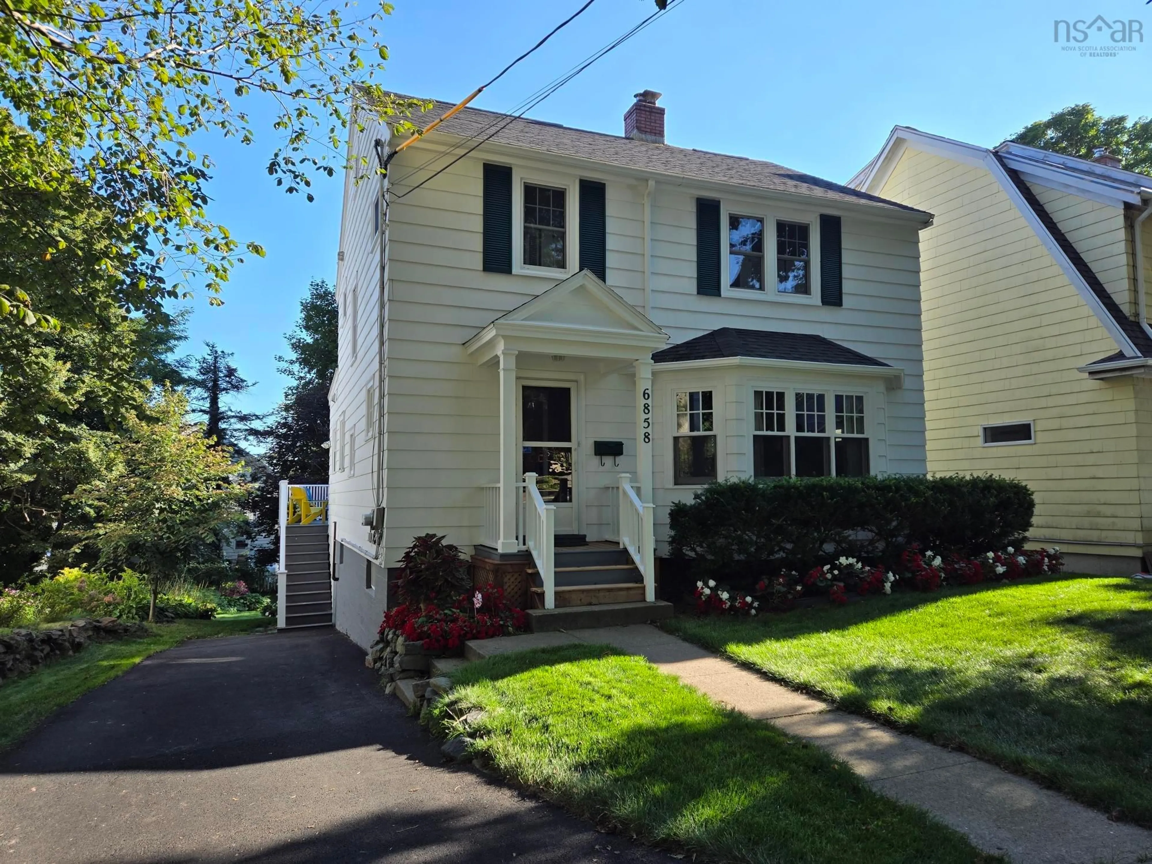Home with vinyl exterior material, street for 6858 Churchill Dr, Halifax Nova Scotia B3L 1E7