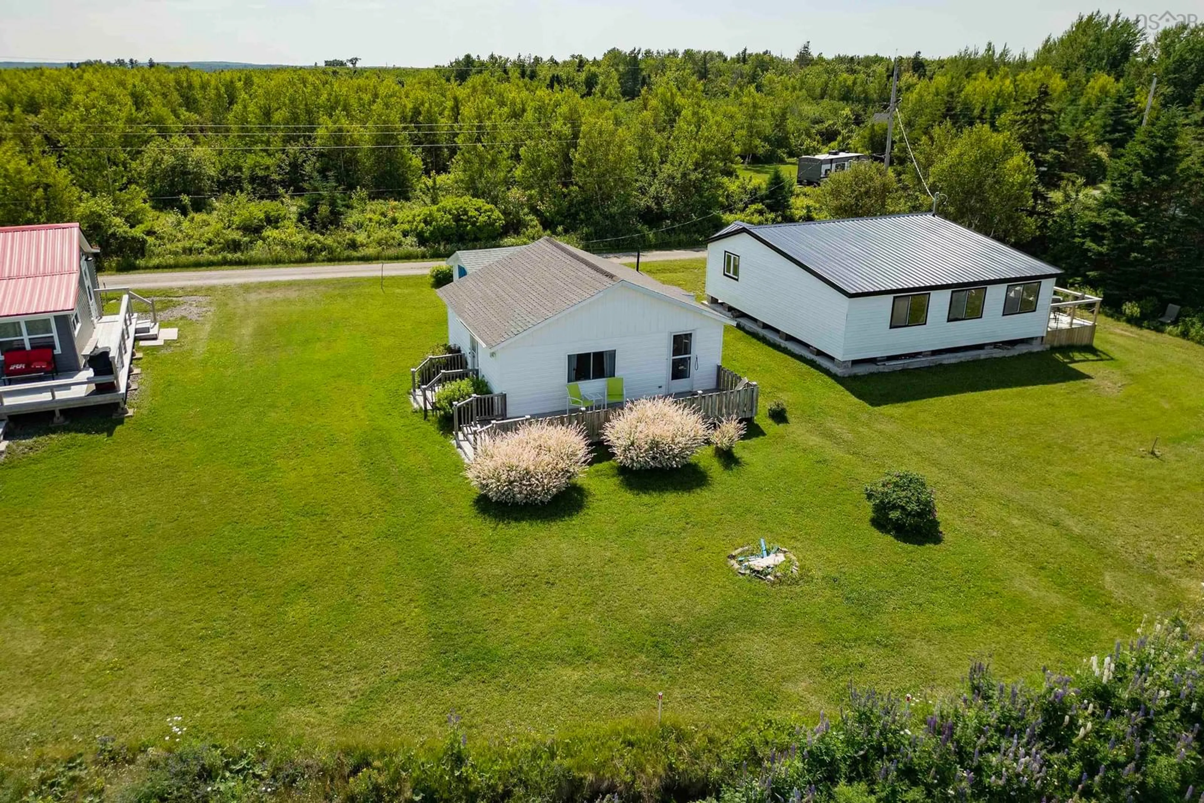 A pic from outside/outdoor area/front of a property/back of a property/a pic from drone, water/lake/river/ocean view for 130 Beach Rd, Port Howe Nova Scotia B0K 1K0
