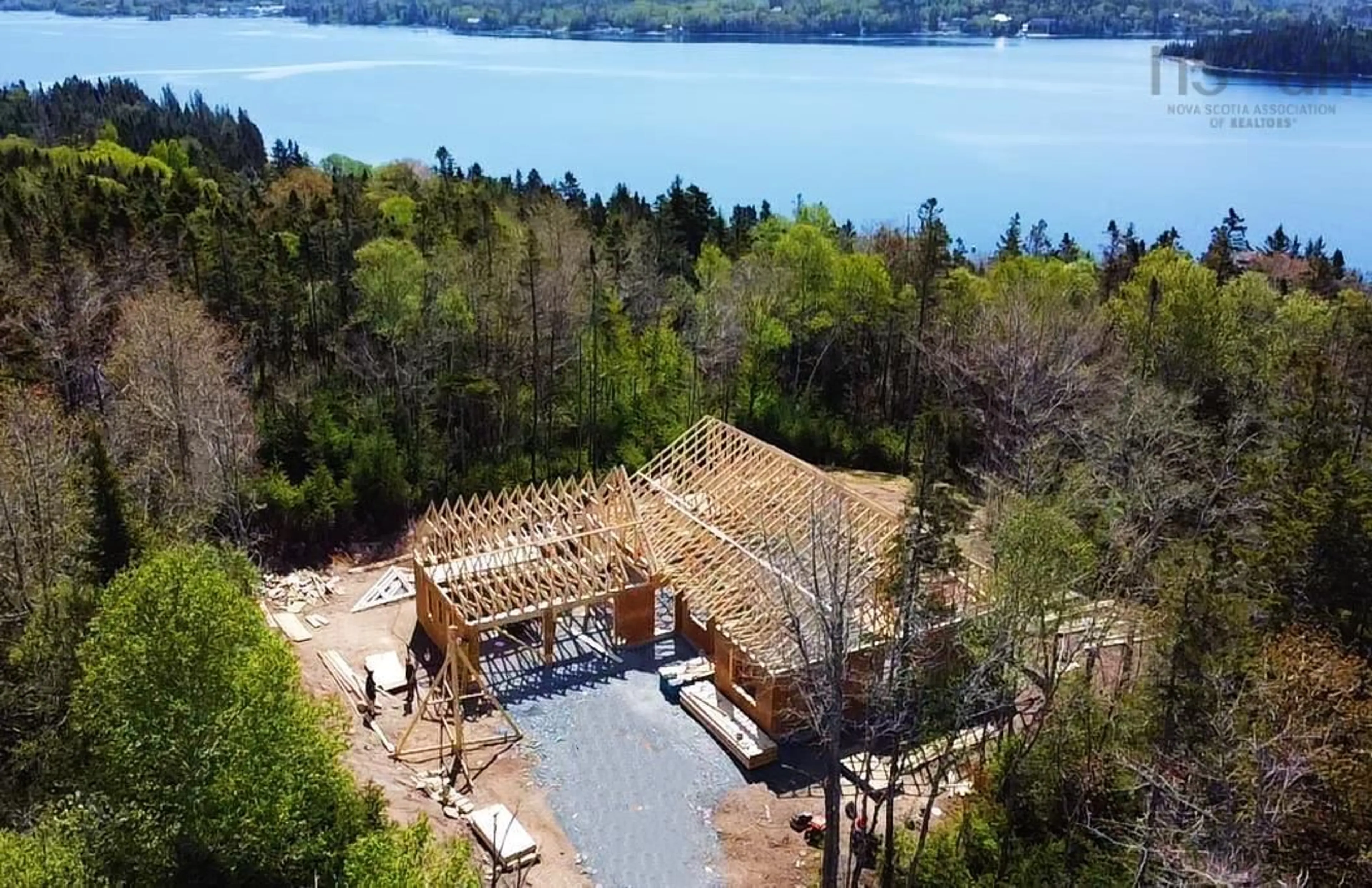 A pic from outside/outdoor area/front of a property/back of a property/a pic from drone, water/lake/river/ocean view for 85 Hillside Dr #Lot 1-3, Boutiliers Point Nova Scotia B3Z 1W9