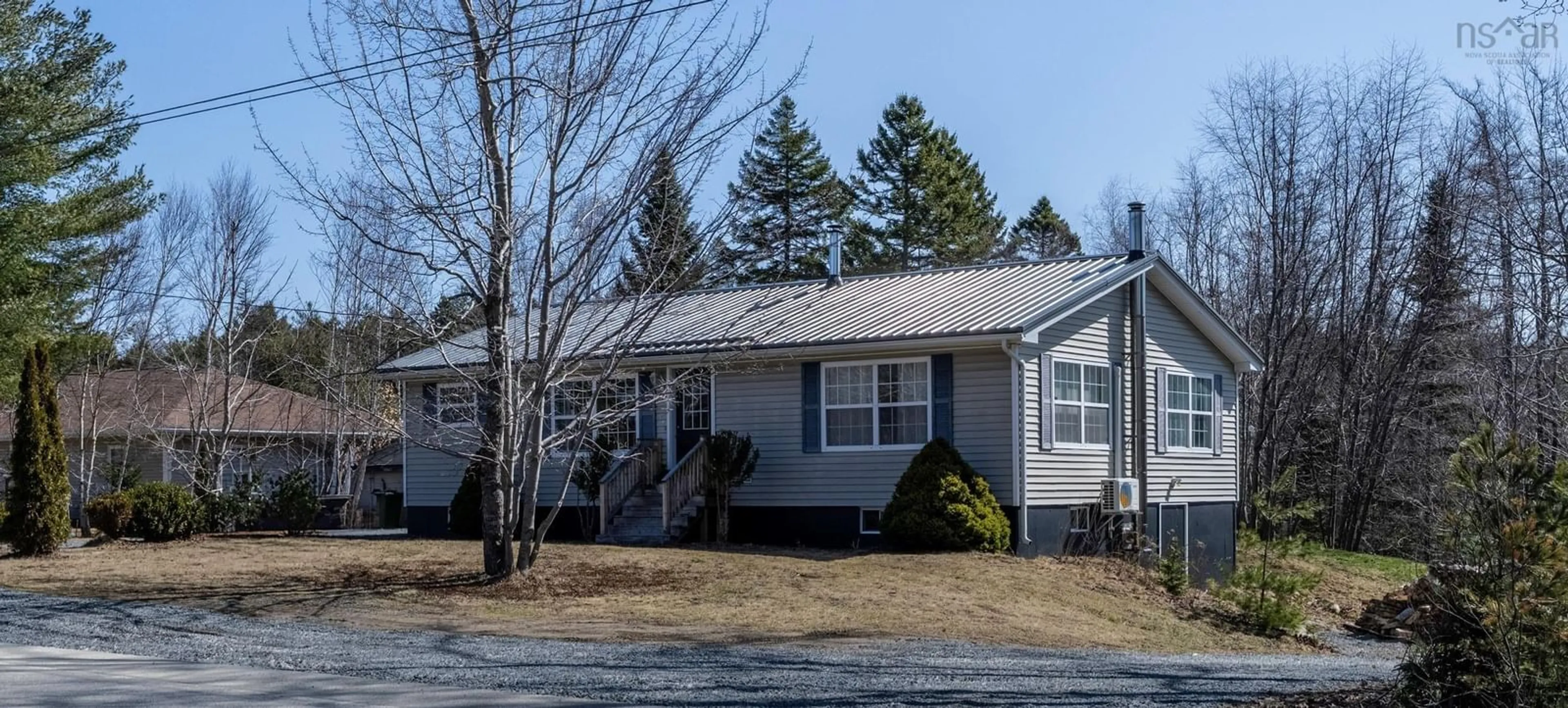 Home with vinyl exterior material, street for 12287 3 Hwy, Spectacle Lakes Nova Scotia B0J 2C0