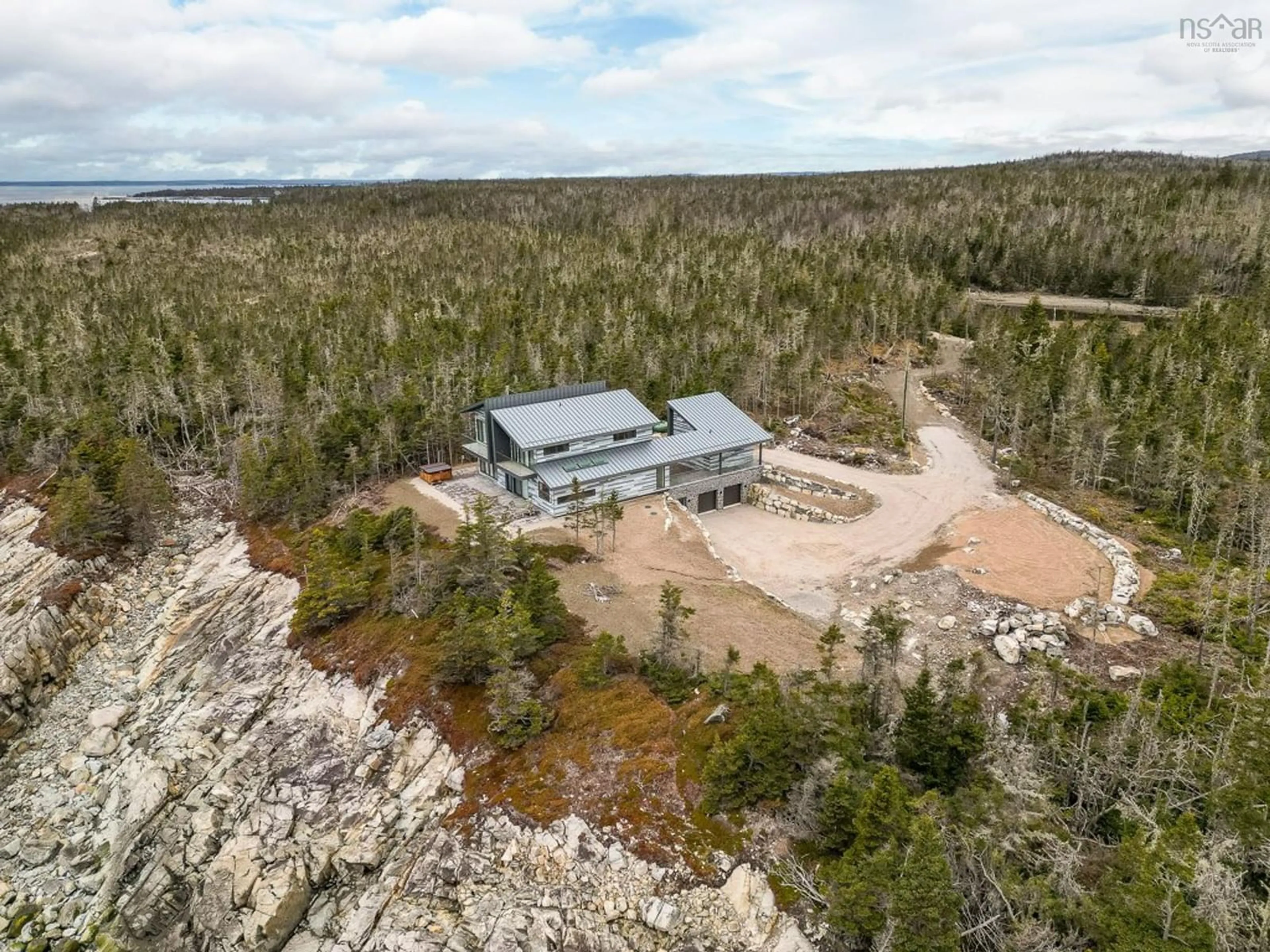 A pic from outside/outdoor area/front of a property/back of a property/a pic from drone, unknown for 112 Herring Point Rd, Blandford Nova Scotia B0J 1T0