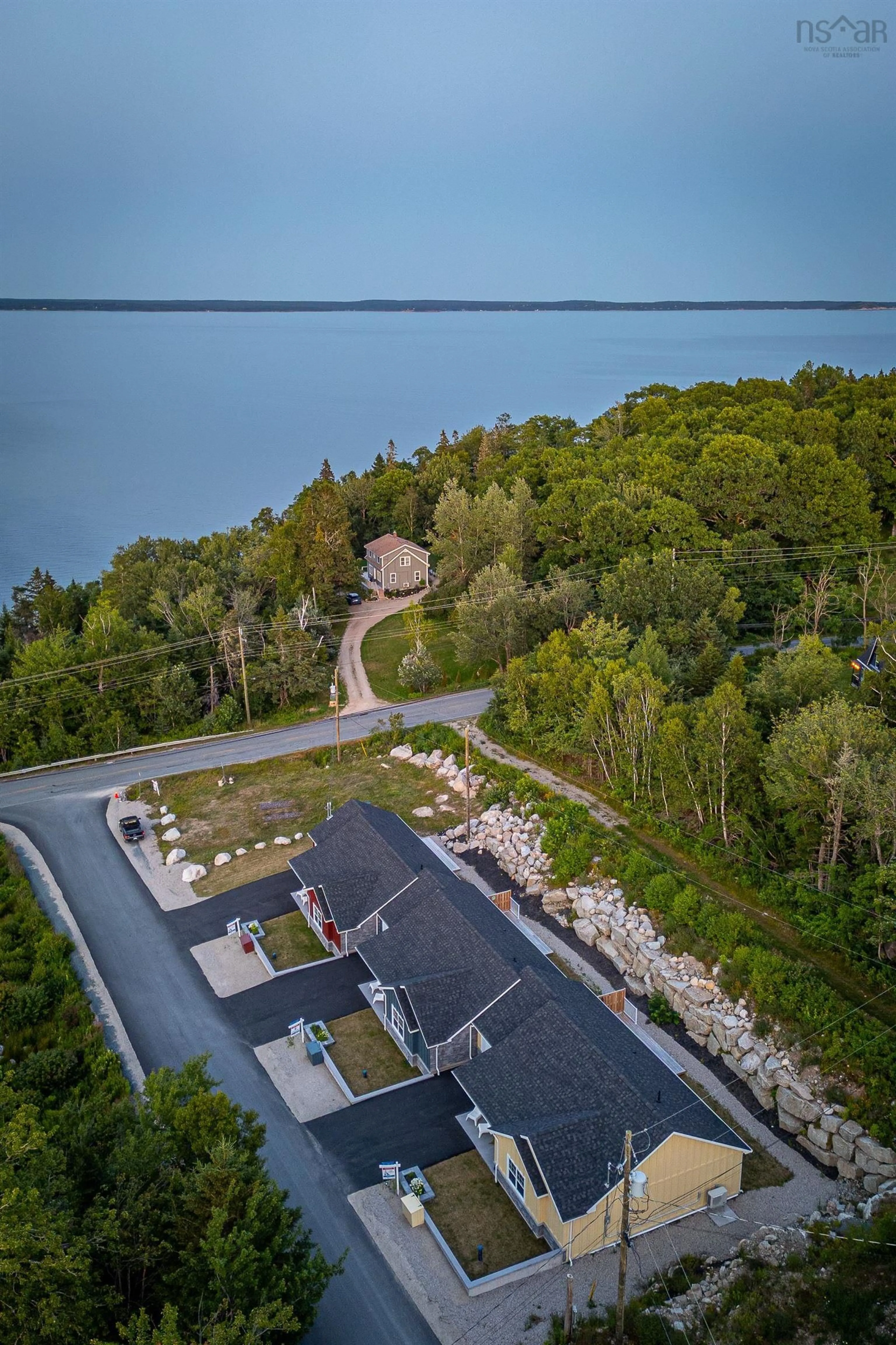 A pic from outside/outdoor area/front of a property/back of a property/a pic from drone, water/lake/river/ocean view for 9 Lions Club Rd, Fox Point Nova Scotia B0J 1T0