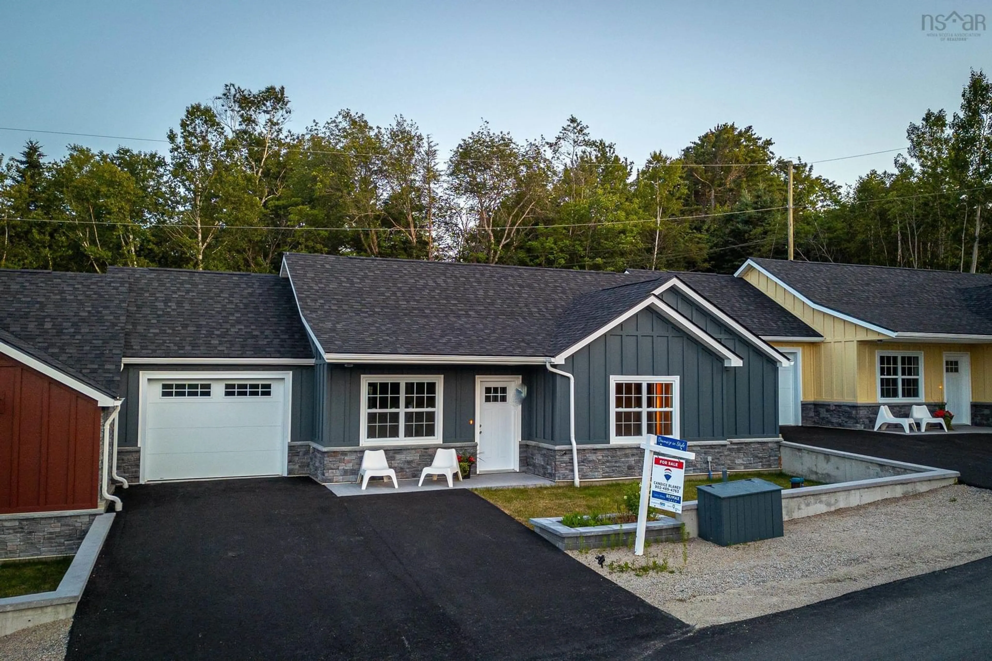 Home with vinyl exterior material, street for 9 Lions Club Rd, Fox Point Nova Scotia B0J 1T0