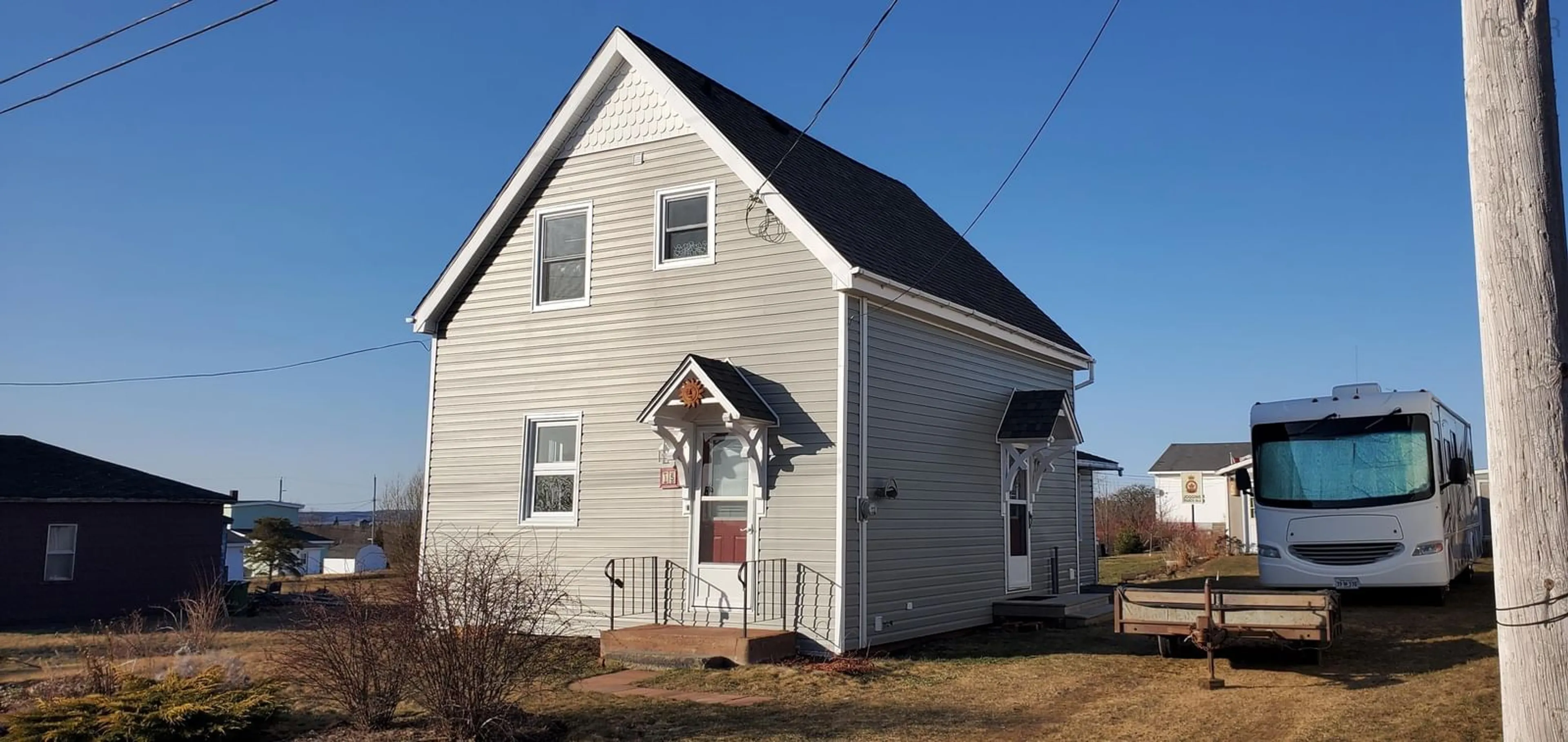 Home with vinyl exterior material, building for 15 Summer Street, Joggins Nova Scotia B0L 1A0