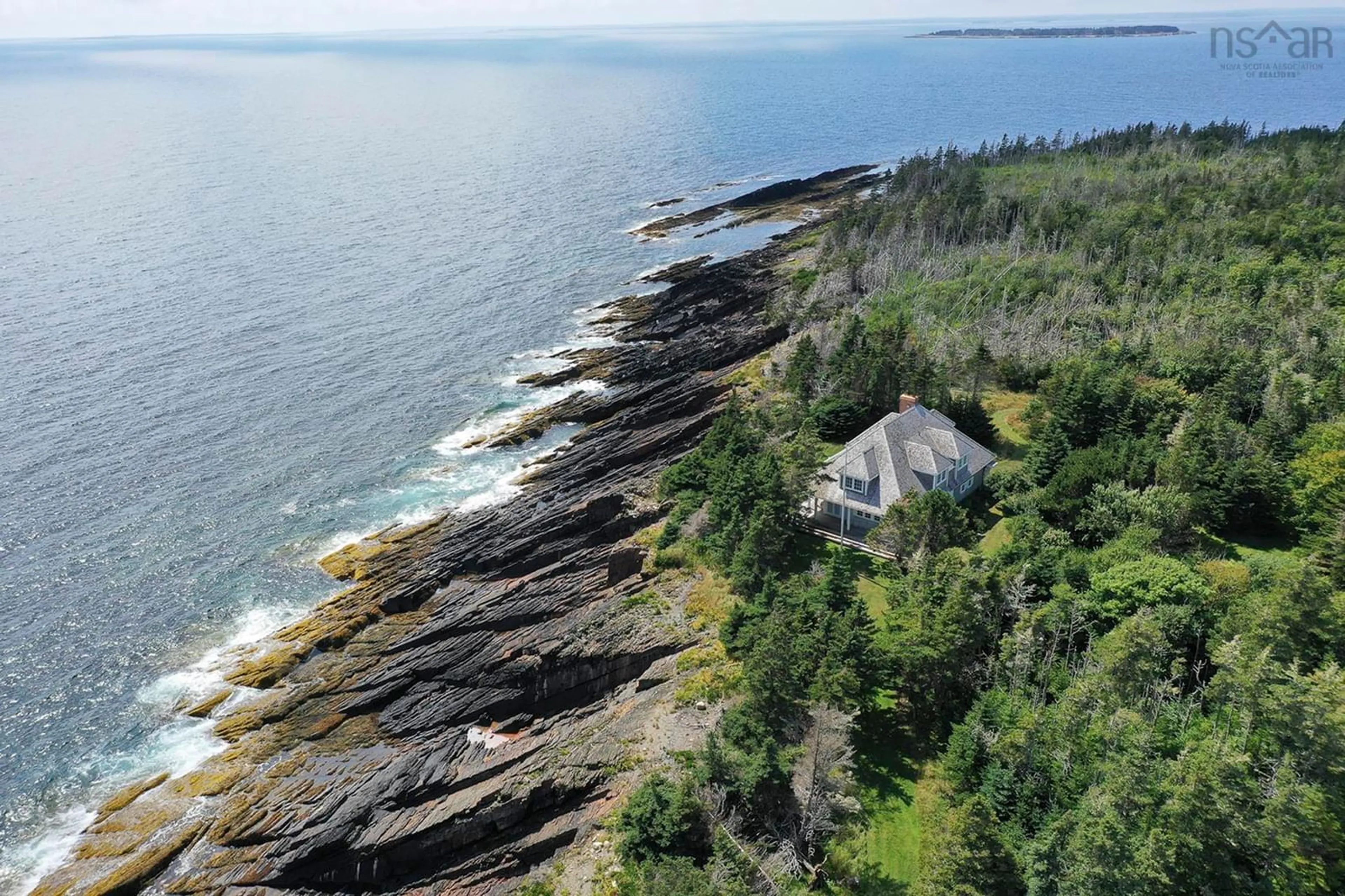 A pic from outside/outdoor area/front of a property/back of a property/a pic from drone, water/lake/river/ocean view for 91 Ironbound Trail, East Ironbound Island Nova Scotia B0J 3G0