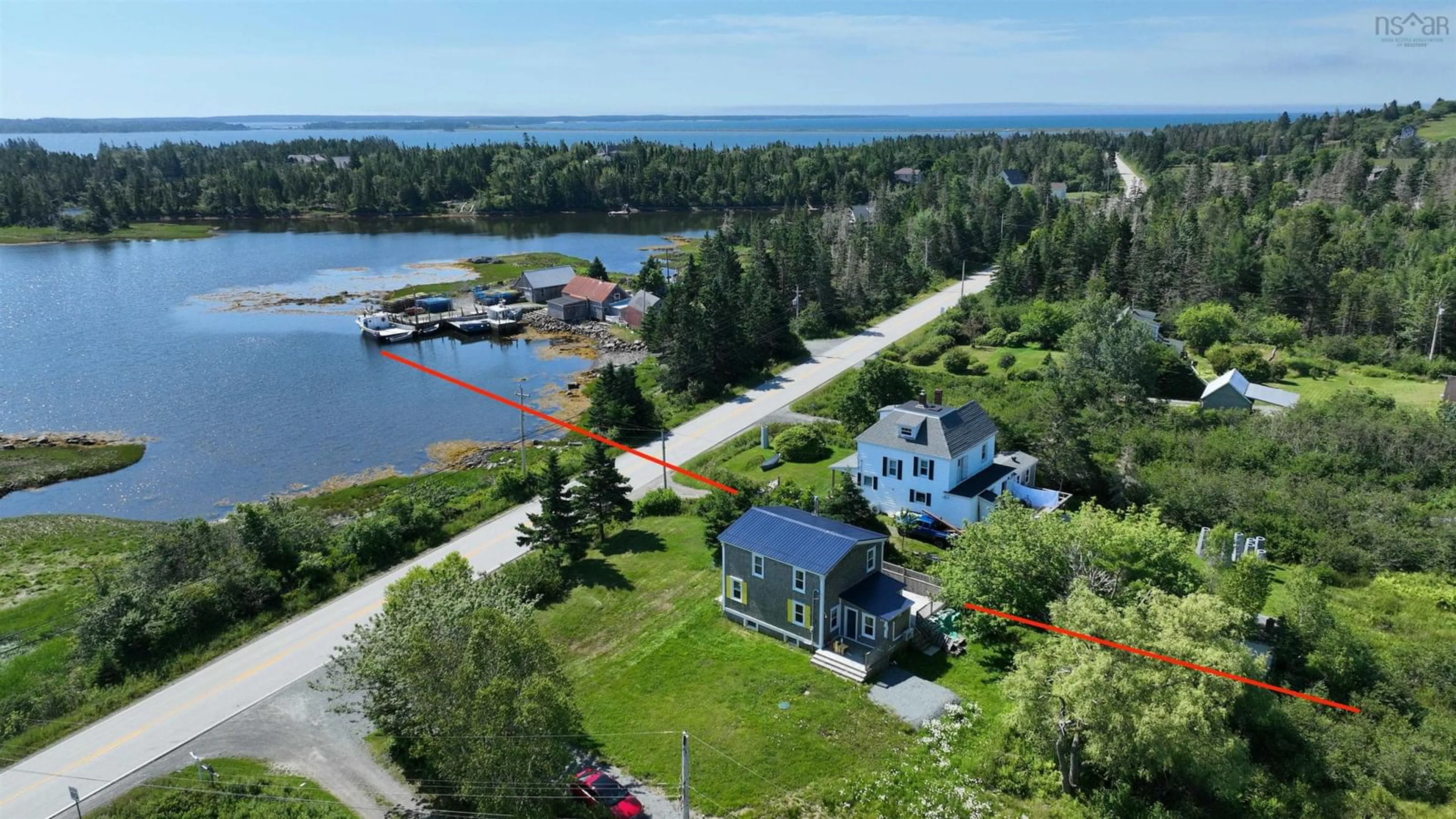 A pic from outside/outdoor area/front of a property/back of a property/a pic from drone, water/lake/river/ocean view for 4760 Highway 331, West Dublin Nova Scotia B0R 1C0