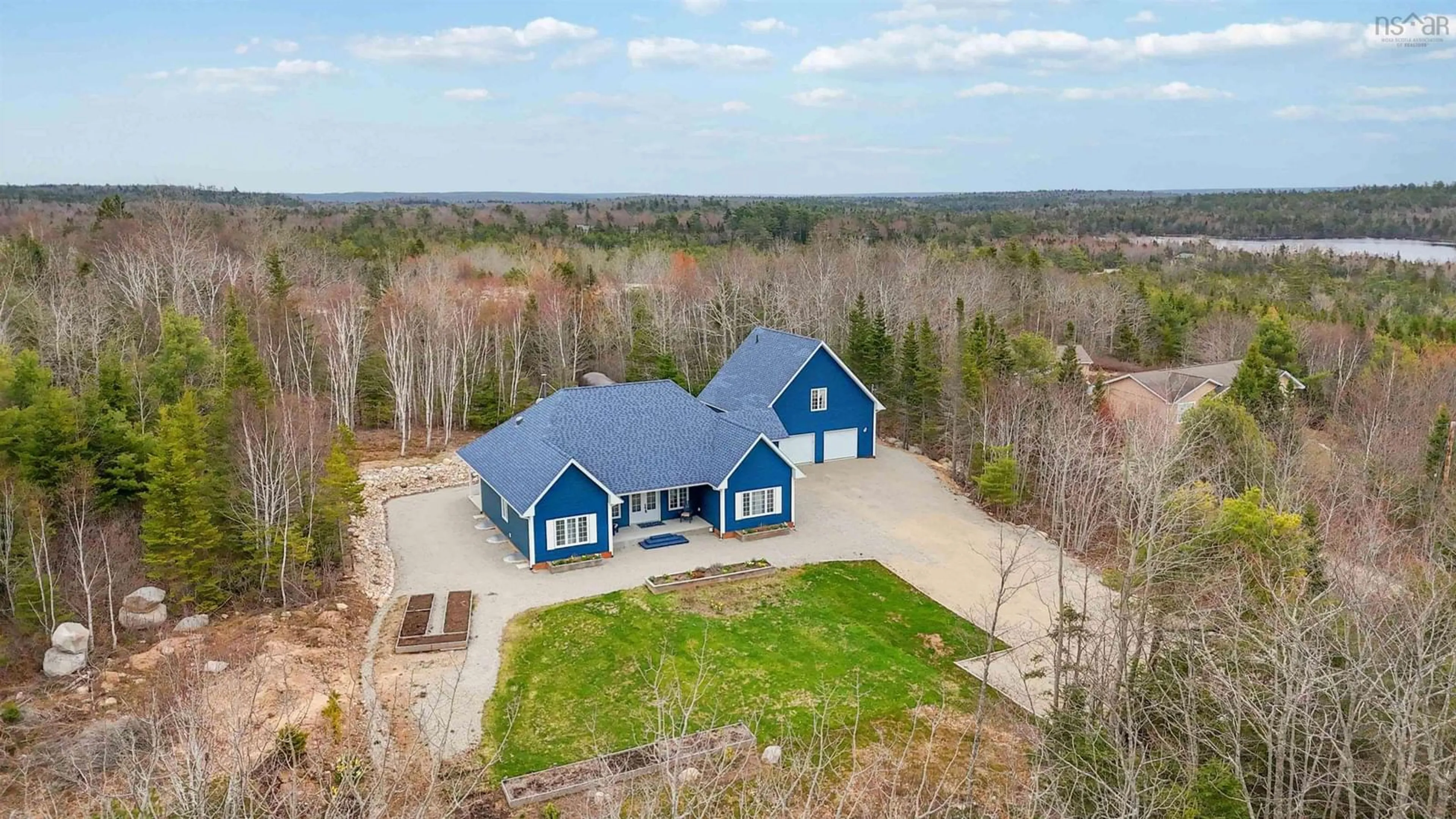 A pic from outside/outdoor area/front of a property/back of a property/a pic from drone, unknown for 113 Langille Estates Dr, Simms Settlement Nova Scotia B0J 1T0