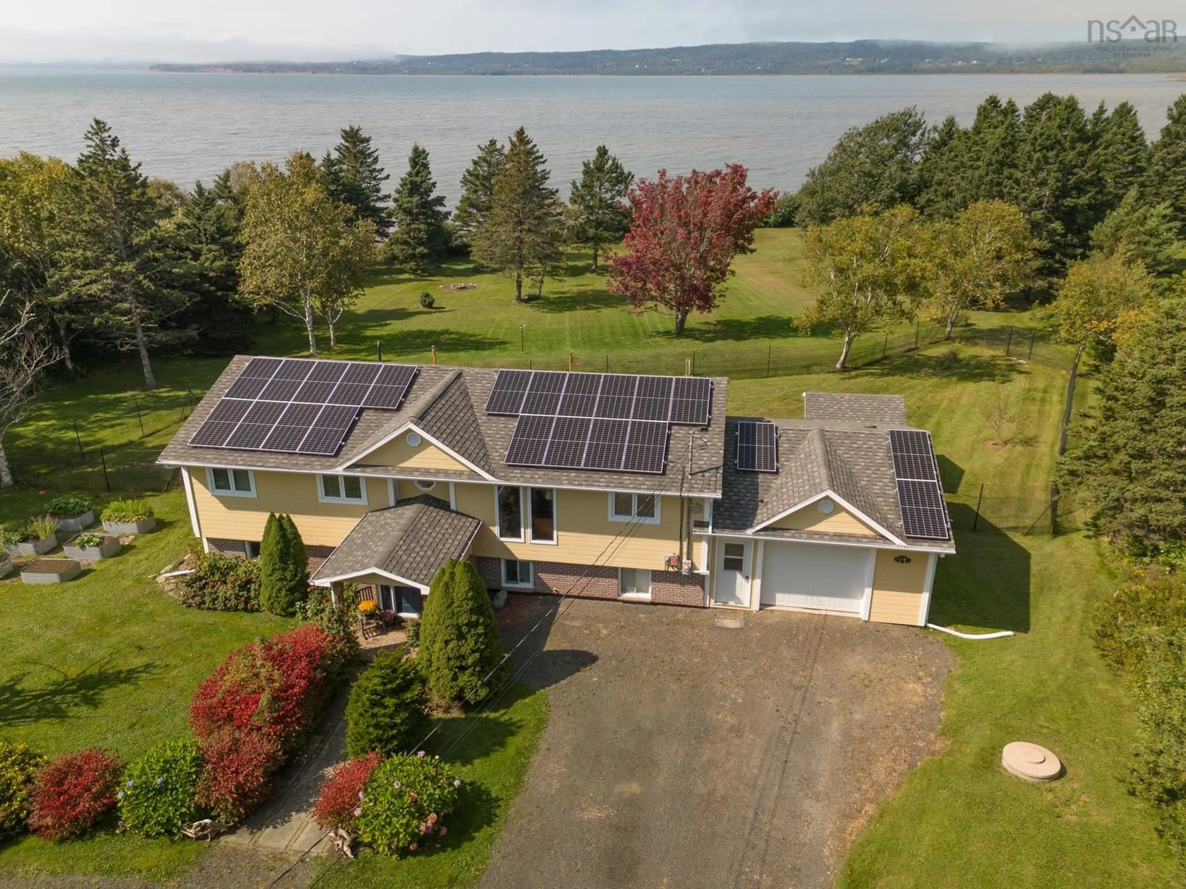 A pic from outside/outdoor area/front of a property/back of a property/a pic from drone, water/lake/river/ocean view for 8993 Highway 101, Brighton Nova Scotia B0V 1A0